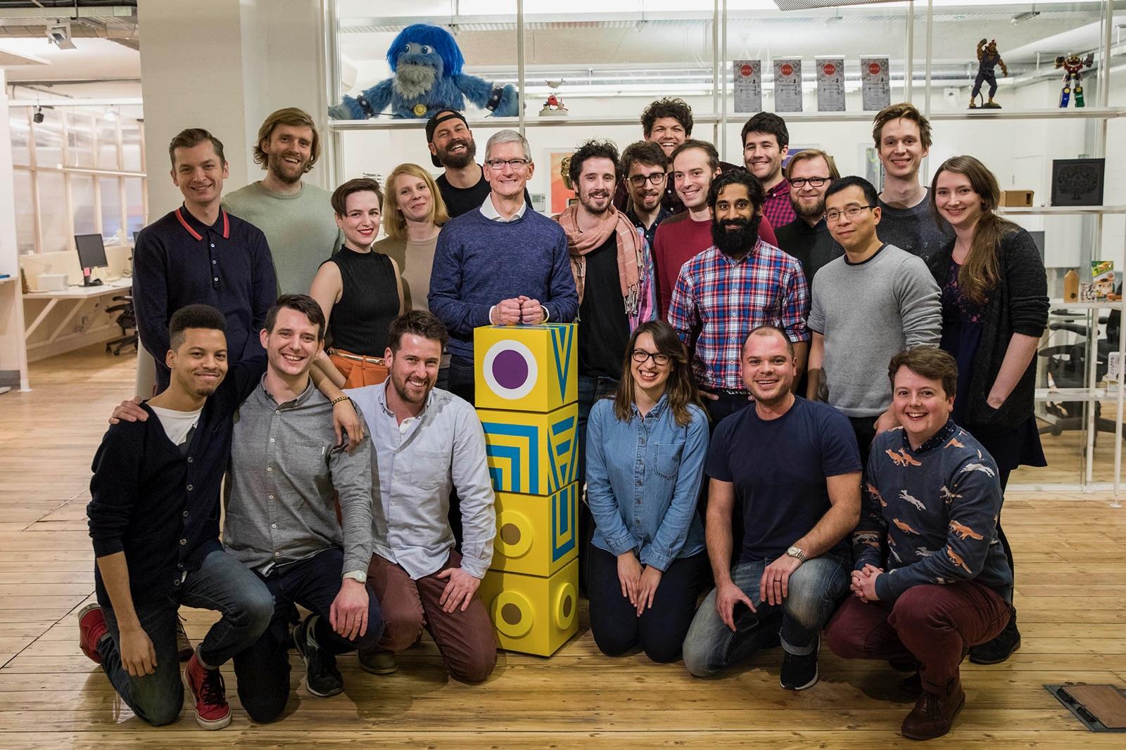 ustwo staff around Tim Cook, Apple's CEO