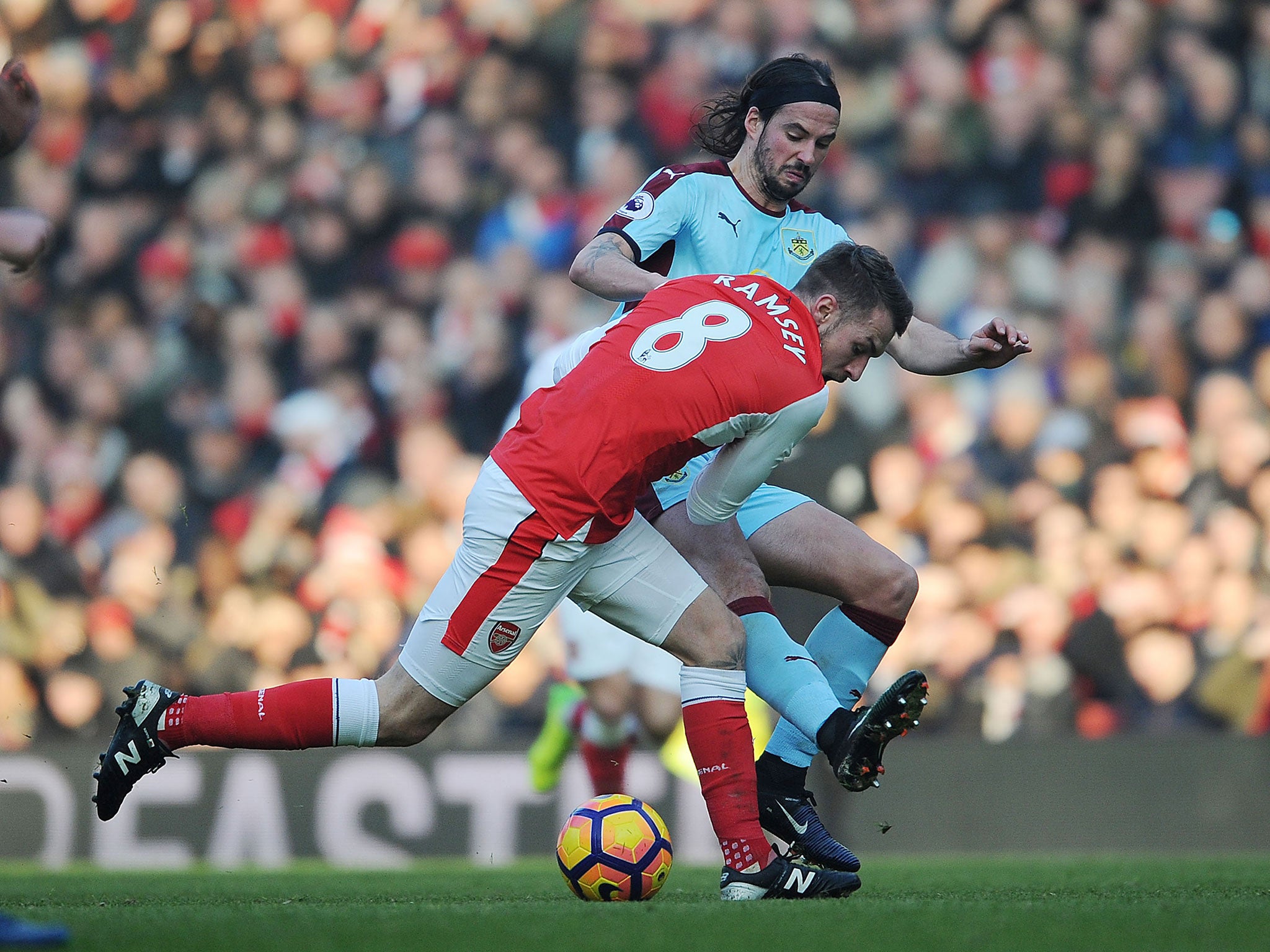 Boyd bids to dispossess Arsenal's Aaron Ramsey