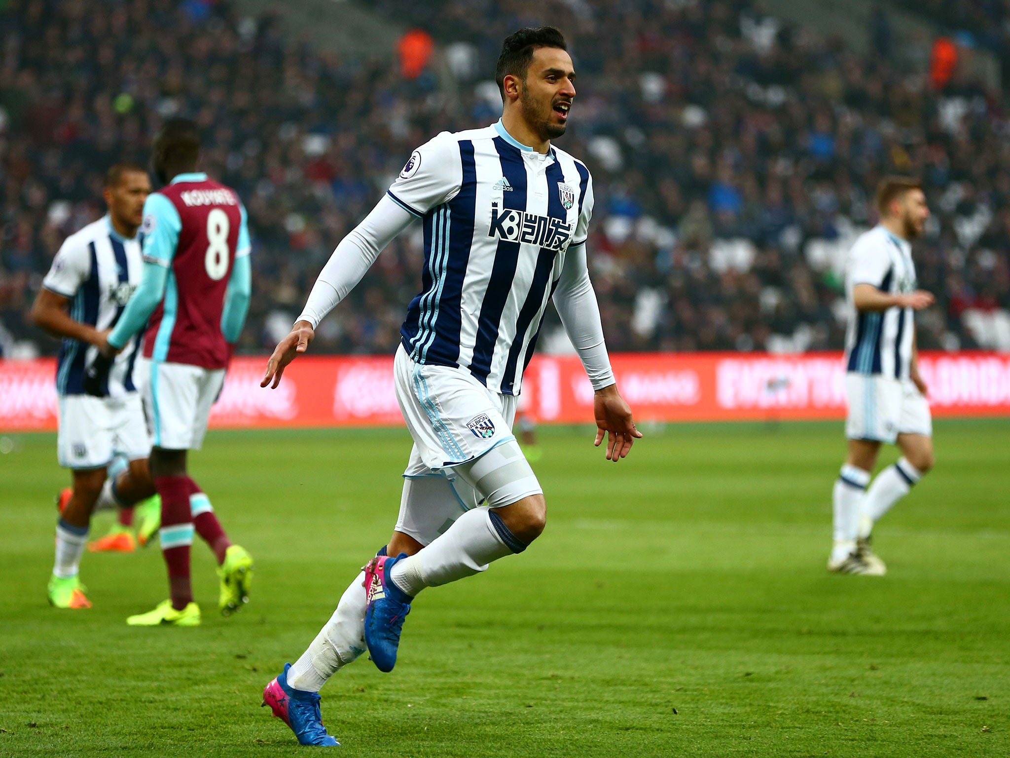 Nacer Chadli celebrates after handing his side the lead