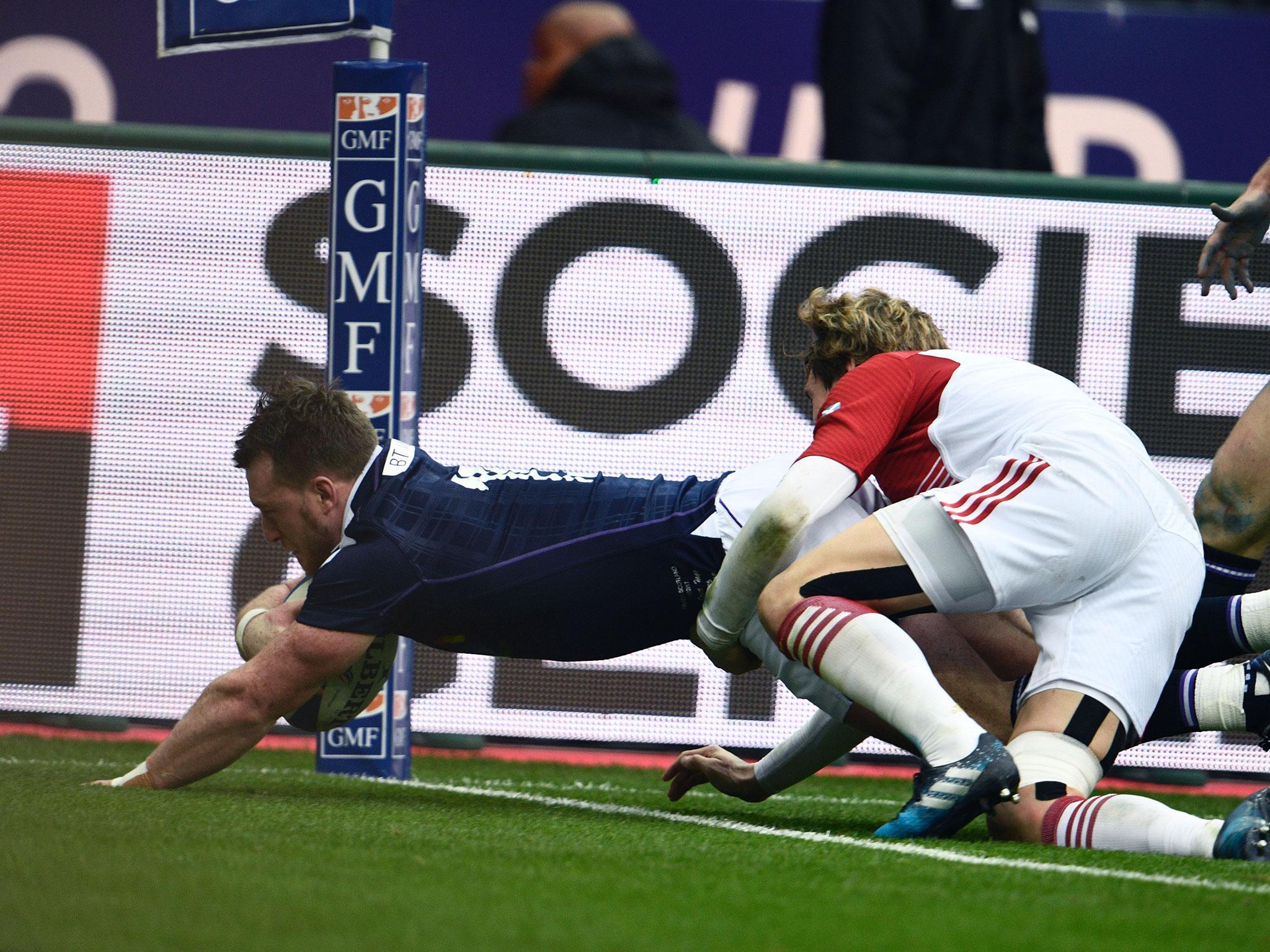 Stuart Hogg scores a try for Scotland against France