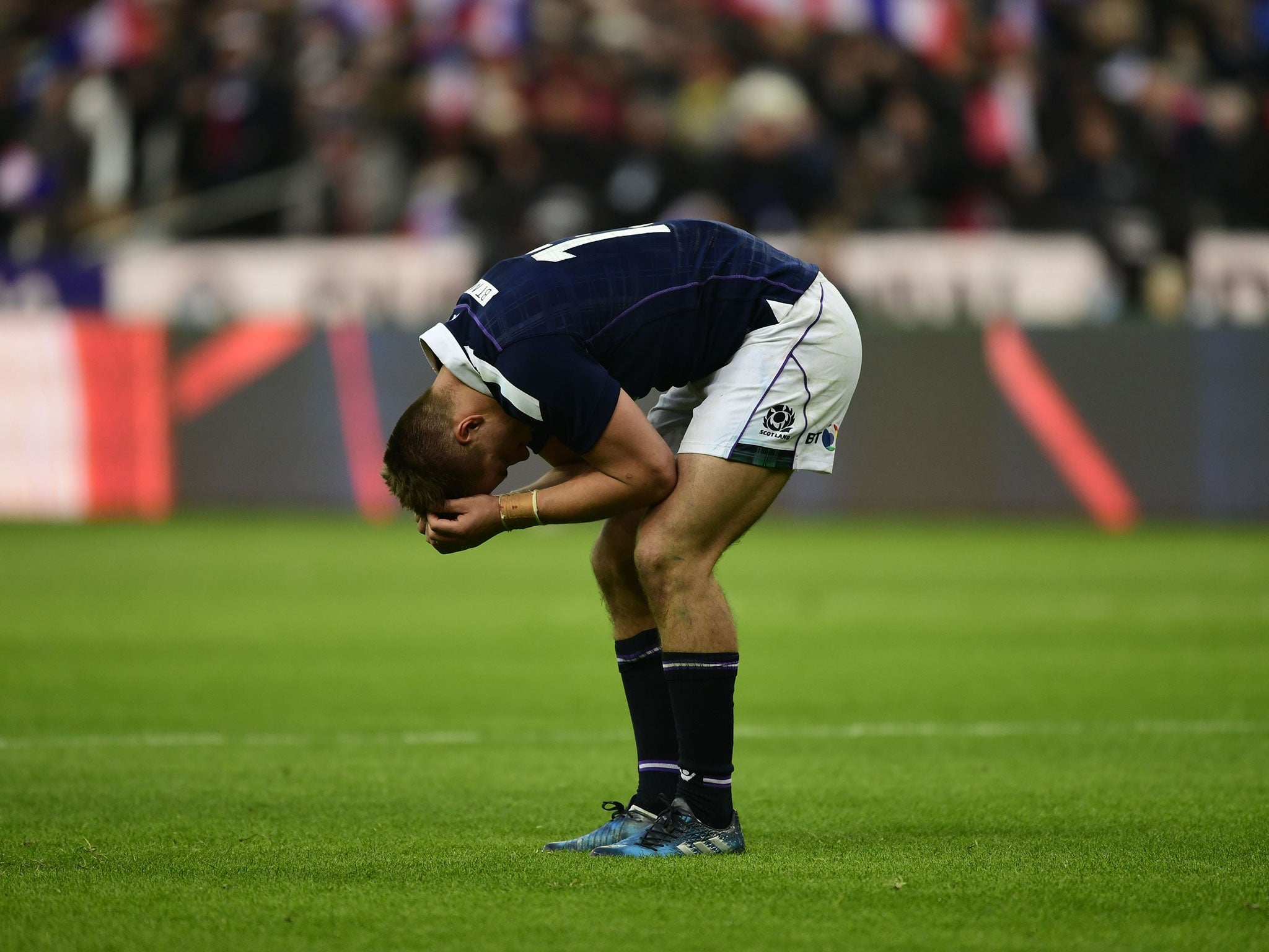 Huw Jones reacts at the full-time whistle