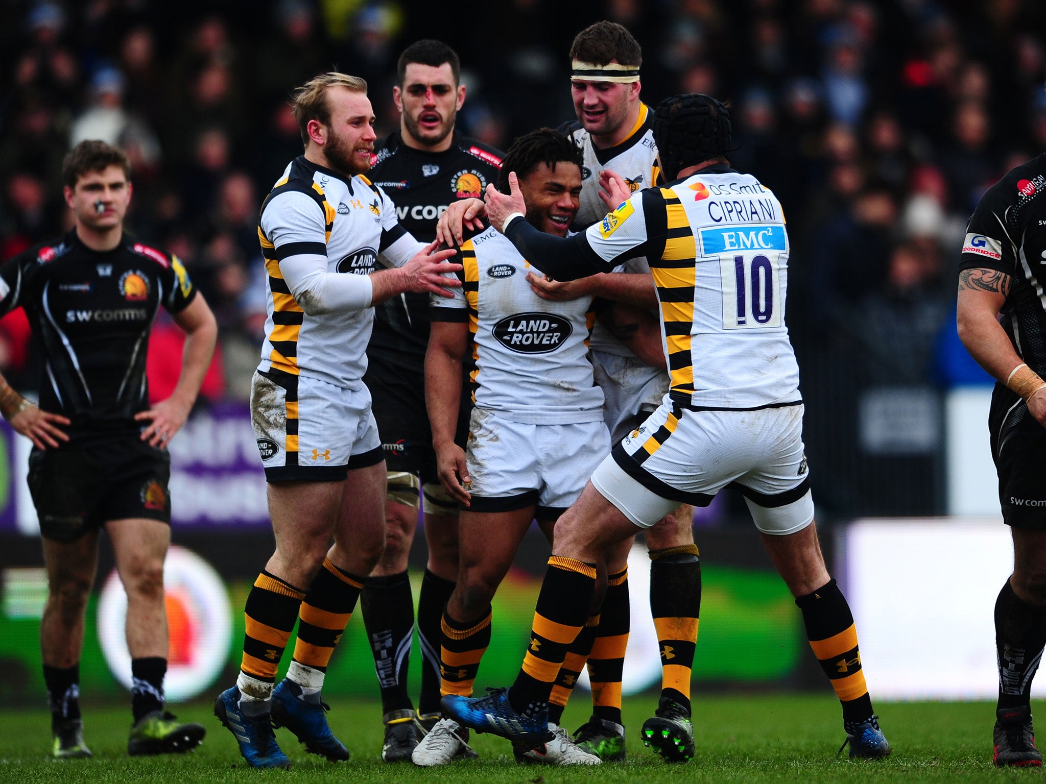 Wasps celebrate after Kyle Eastmond scores a try