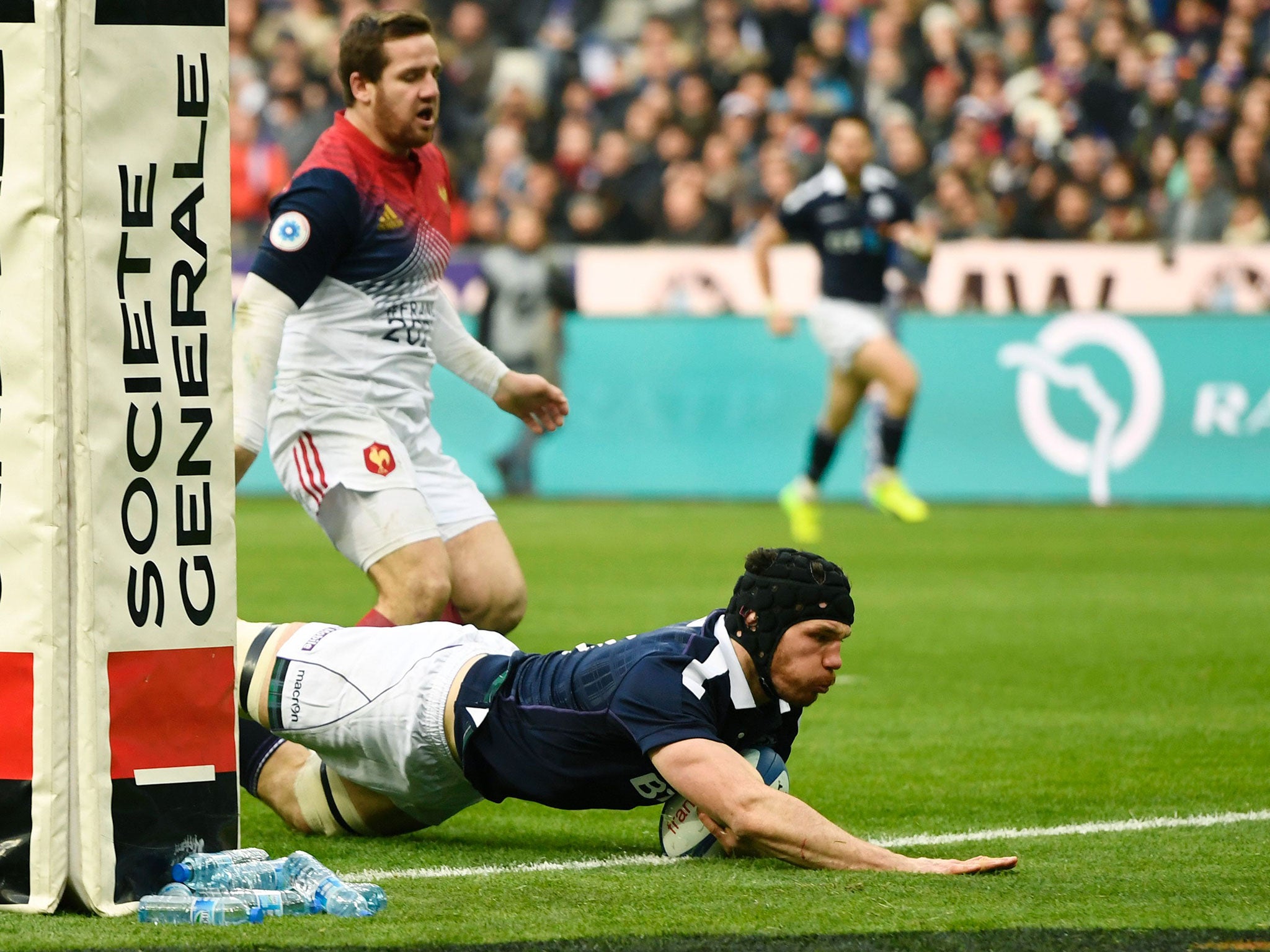 Tim Swinson dives over to score Scotland's second try