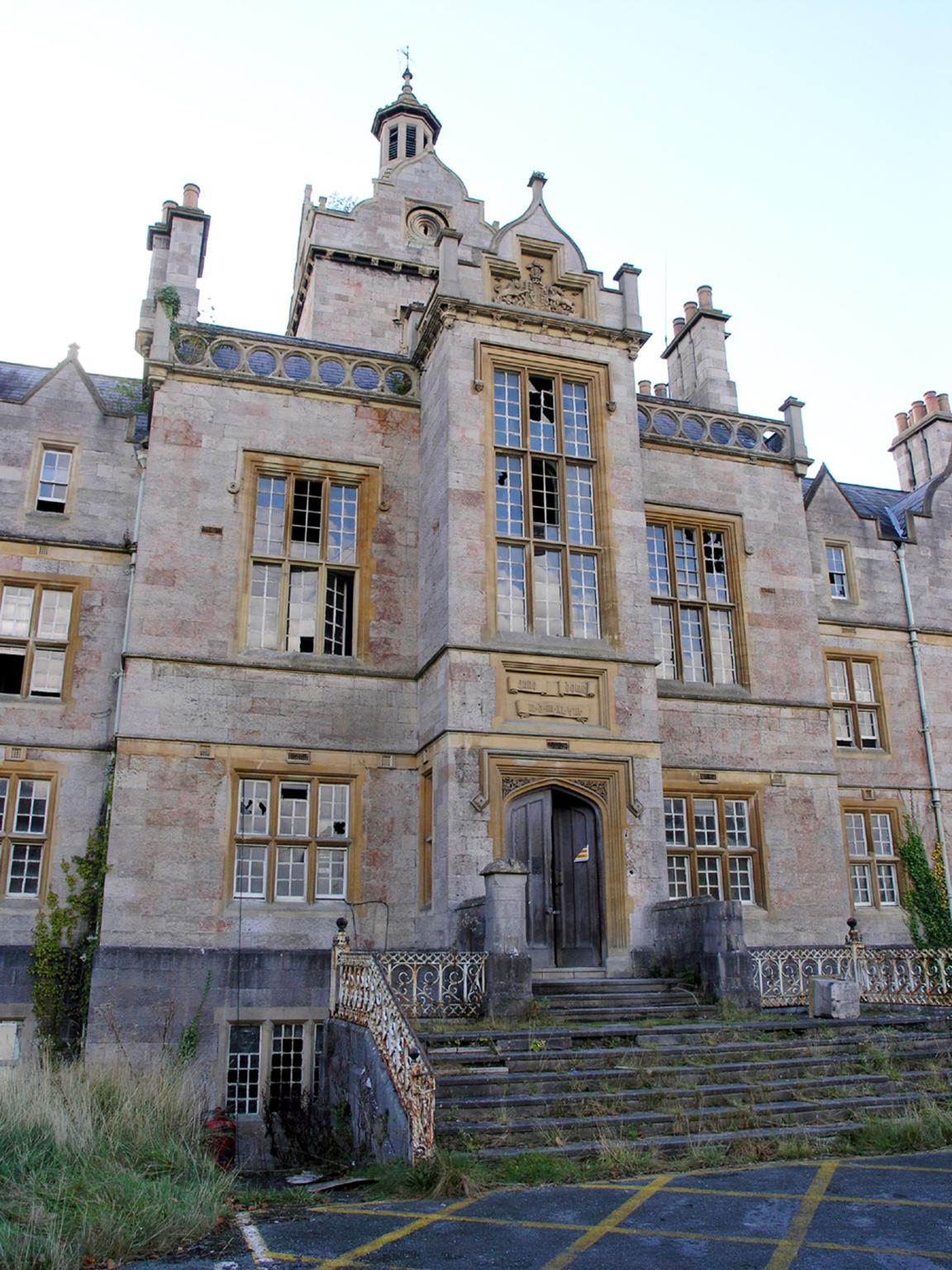 Mad world: the administration block of now-closed Denbigh Asylum in Wales