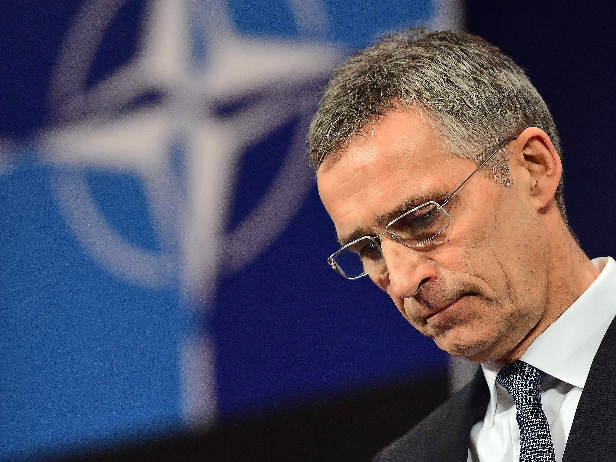 Nato Secretary General Jens Stoltenberg addresses a press conference a day ahead of a NATO defence ministers meetings at NATO headquarters in Brussels (Getty)