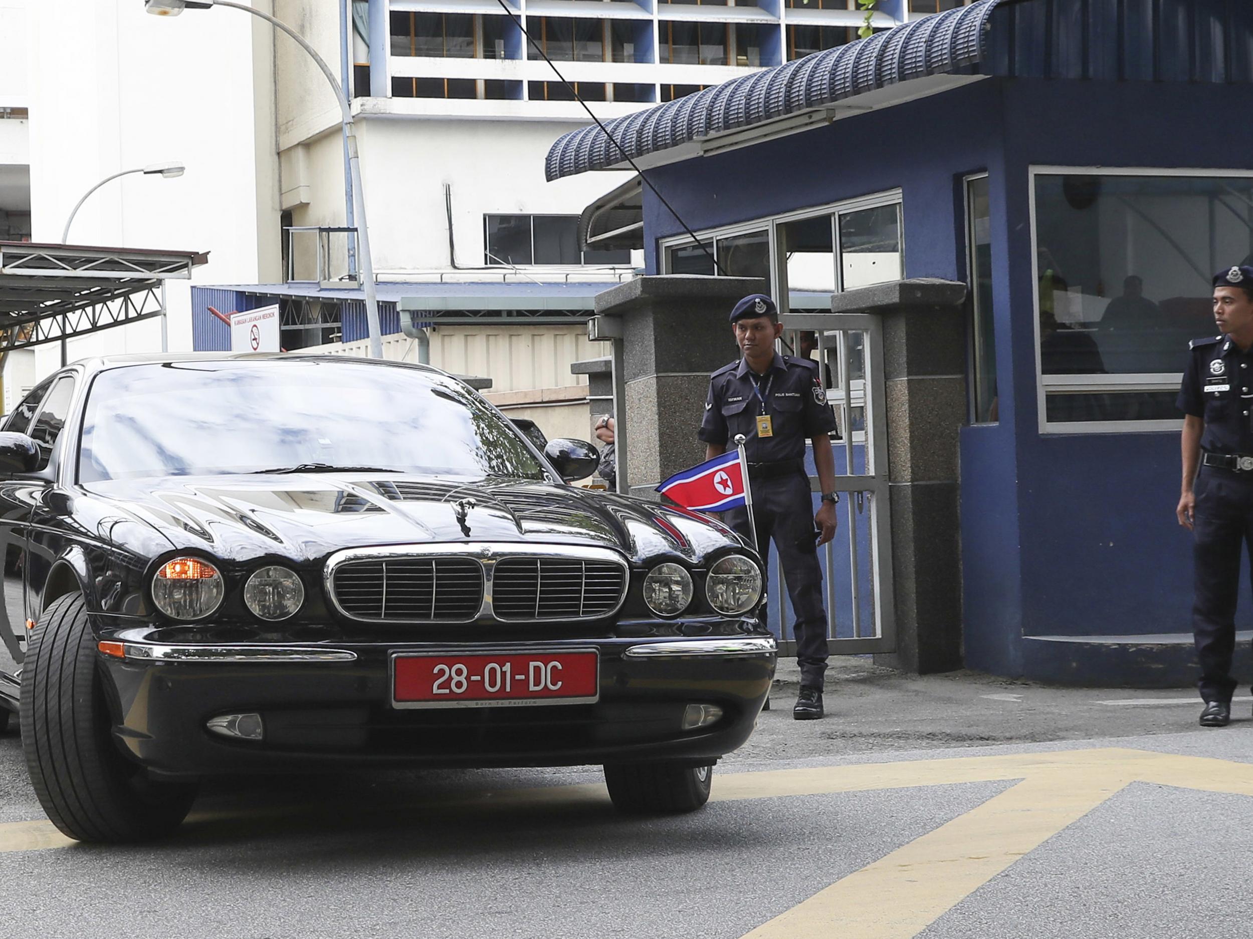 The car of ambassador of North Korea to Malaysia is leaving the forensic department at the hospital in Kuala Lumpur, Malaysia on Wednesday