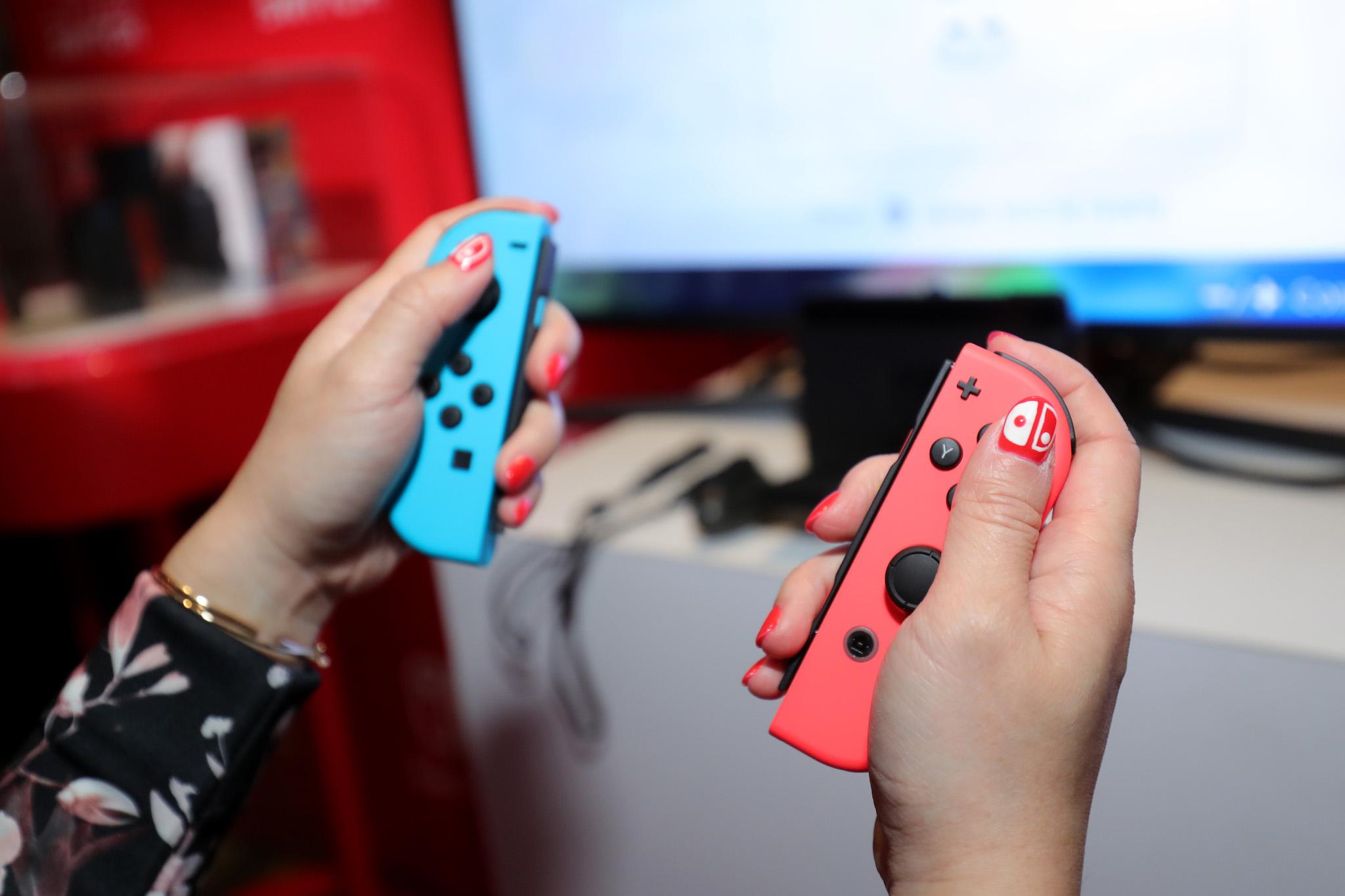 Nintendo of America, A guest enjoys playing Mario Kart 8 Deluxe on the groundbreaking new Nintendo Switch at a special preview event in New York on Jan. 13, 2017