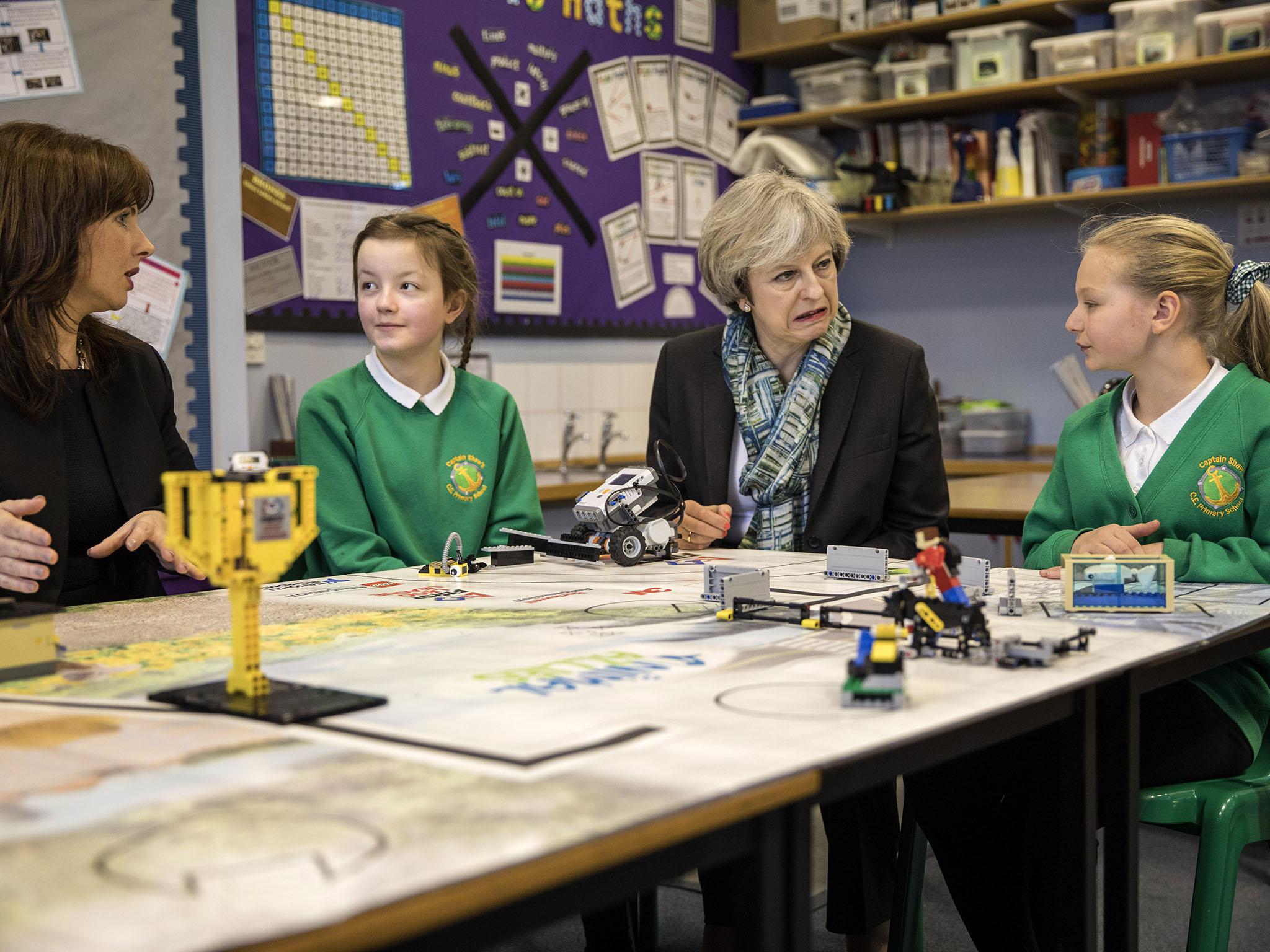 The Conservatives have pledged to remove the cap which prevents schools from choosing all pupils based on faith