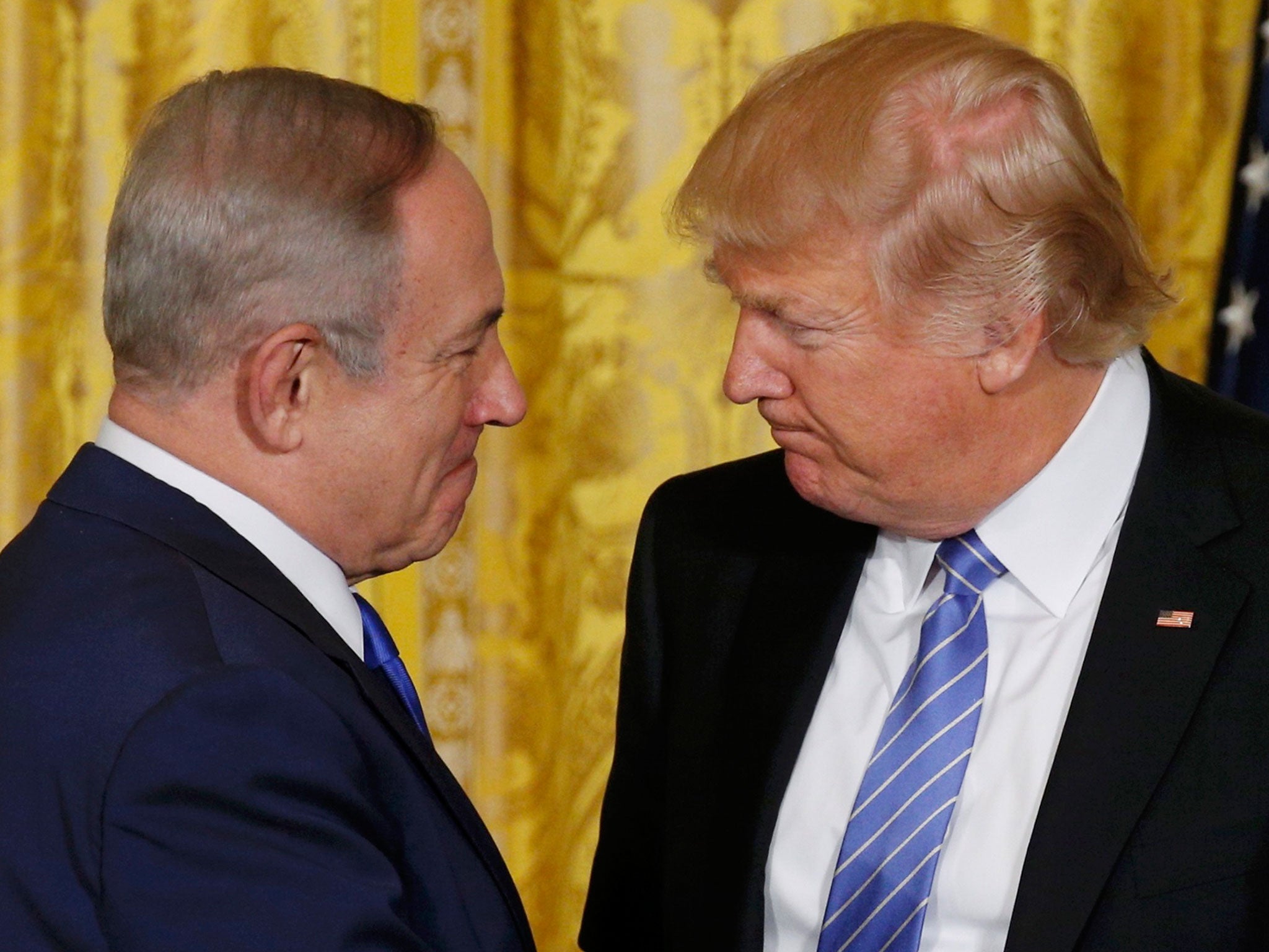 Donald Trump greets Israeli Prime Minister Benjamin Netanyahu at a joint news conference at the White House