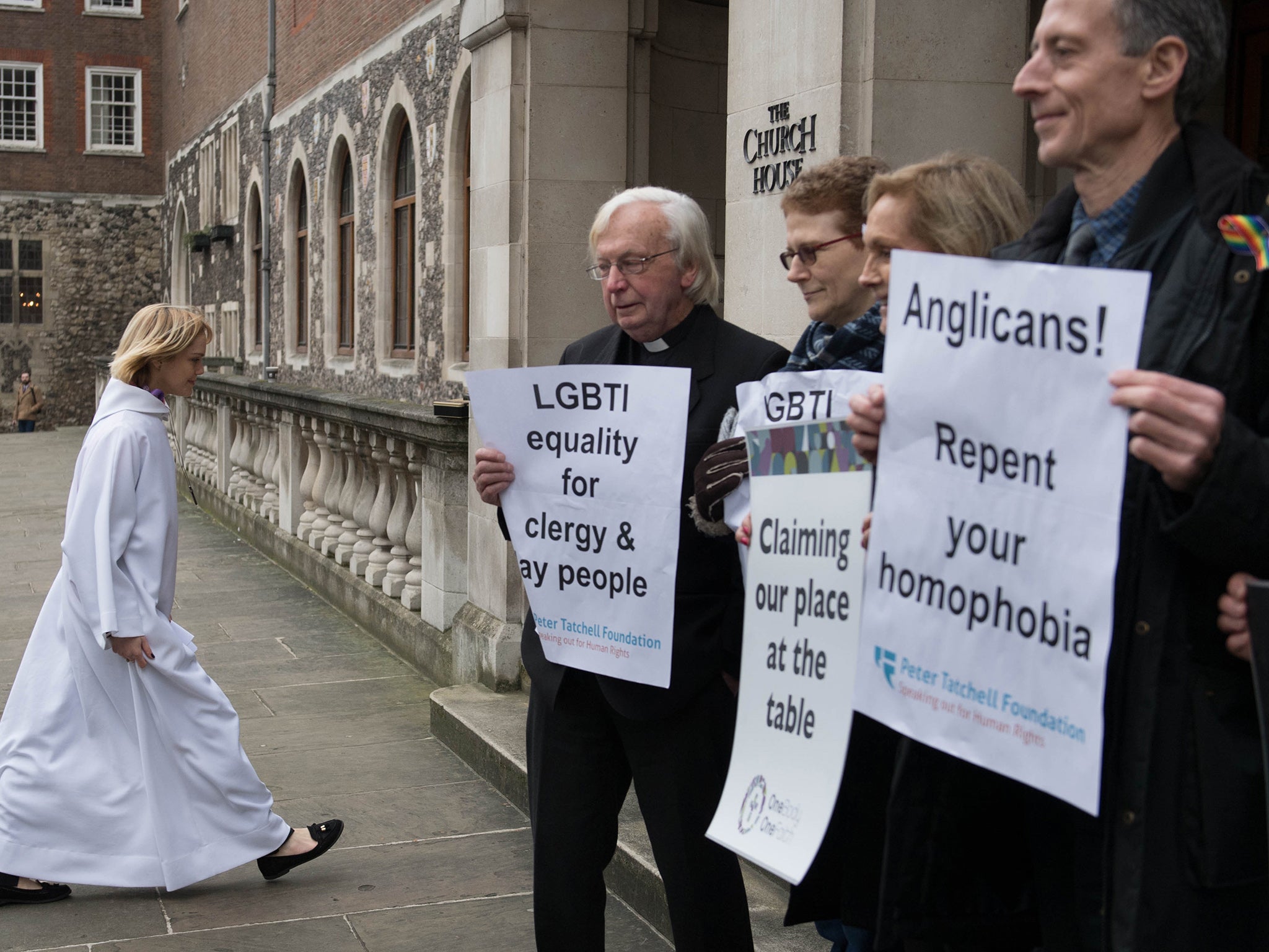 Activists from the Lesbian and Gay Christian movement holding a vigil outside the General Synod - which has now voted in favour of a motion calling on the Government to ban so-called 'gay cure therapy'