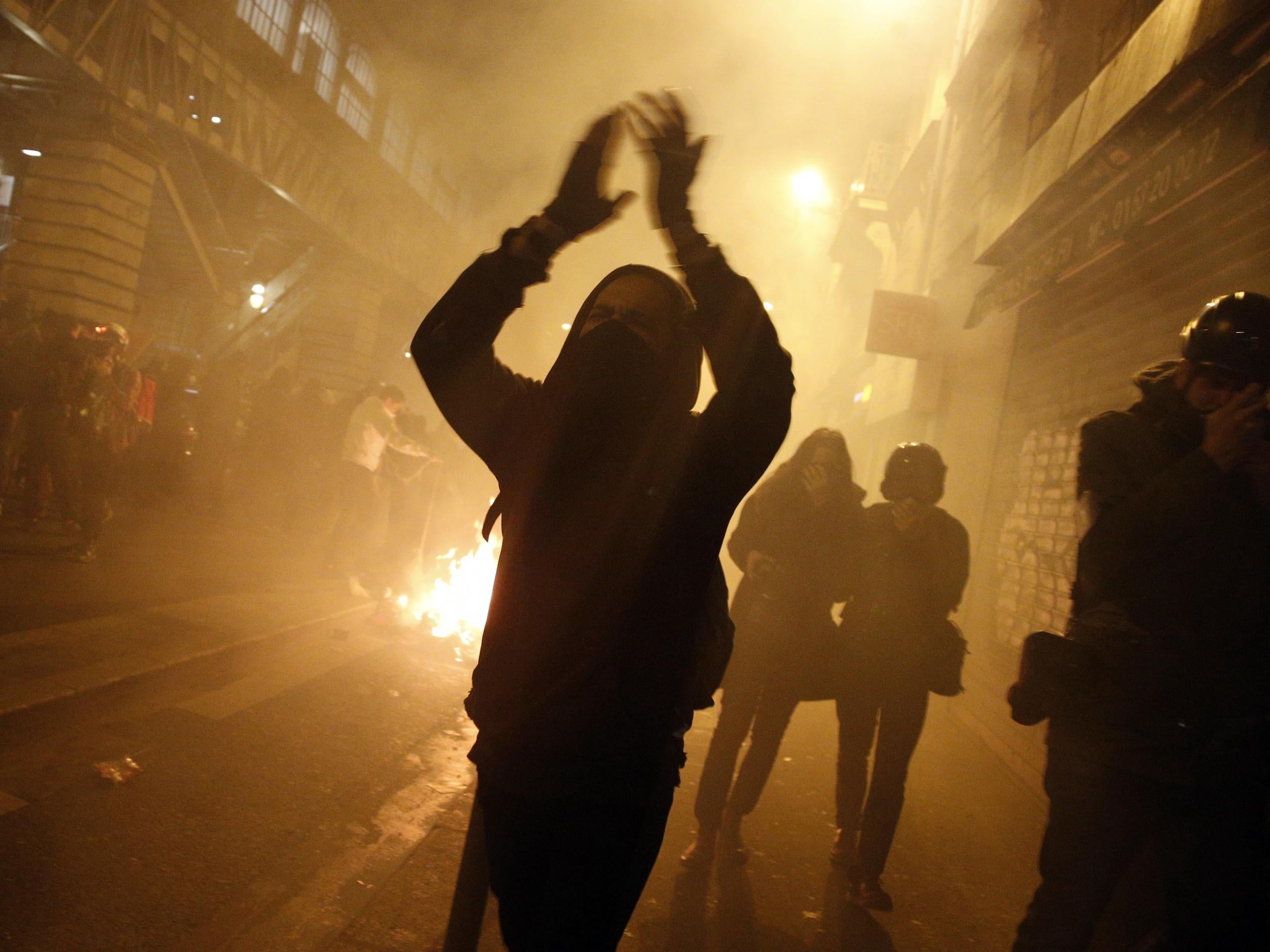 Protesters have clashed with riot police in Paris after an anti-police demonstration turned violent