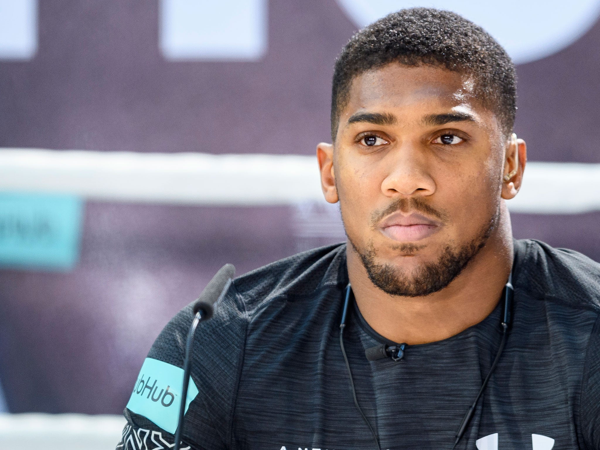 Anthony Joshua speaks at a press conference in Cologne, Germany