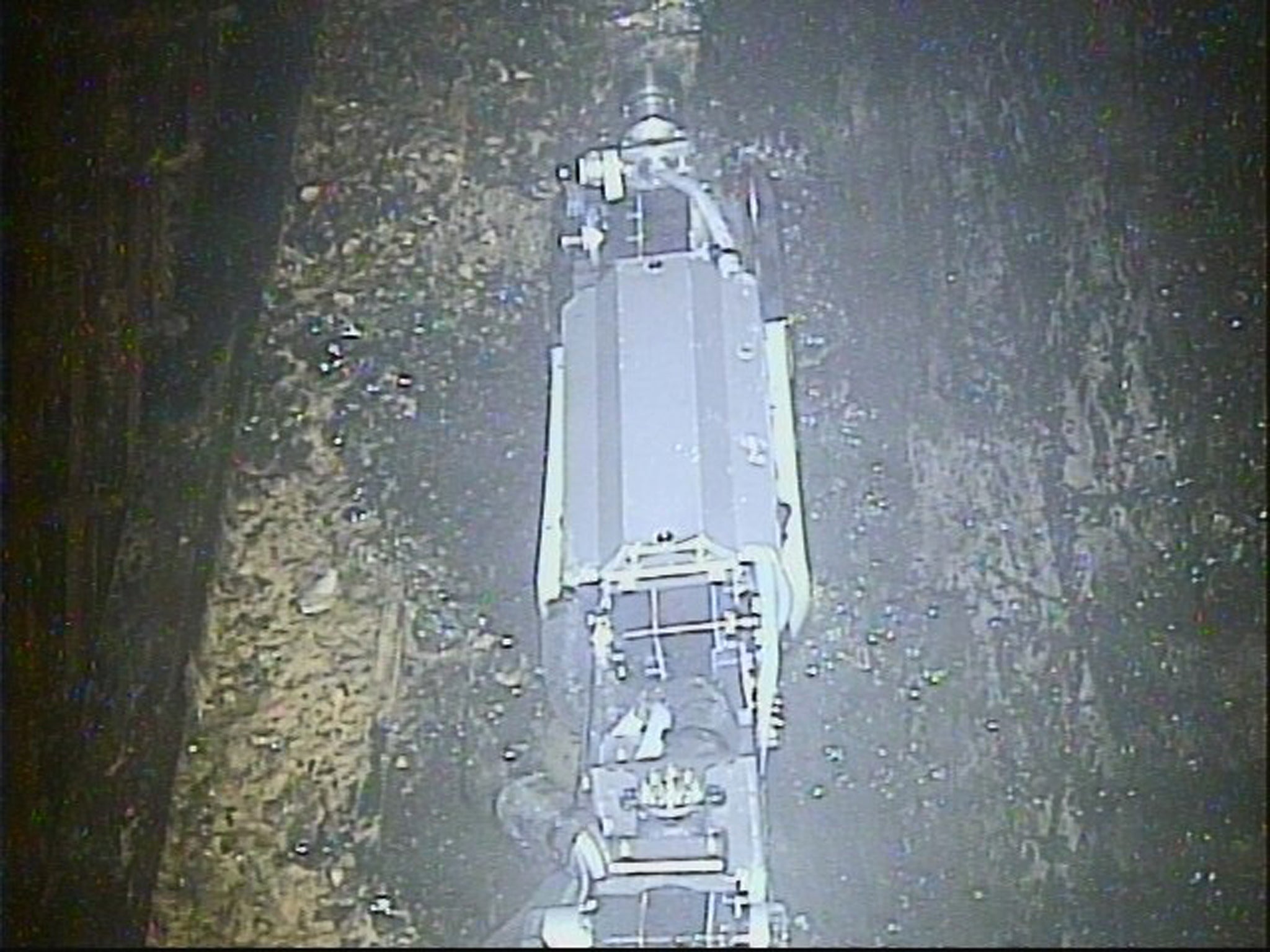 A remote-controlled "scorpion" robot inside the Unit 2 reactor's containment vessel at Fukushima Dai-ichi nuclear power plant