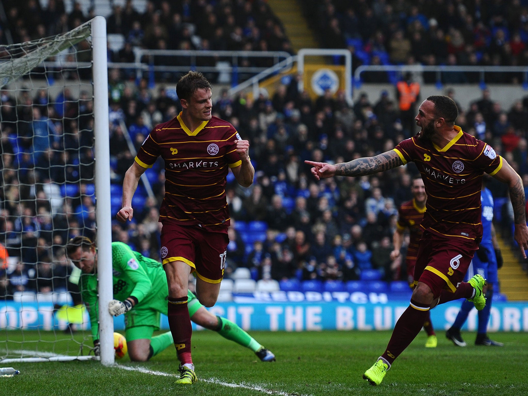 Matt Smith celebrates scoring for QPR