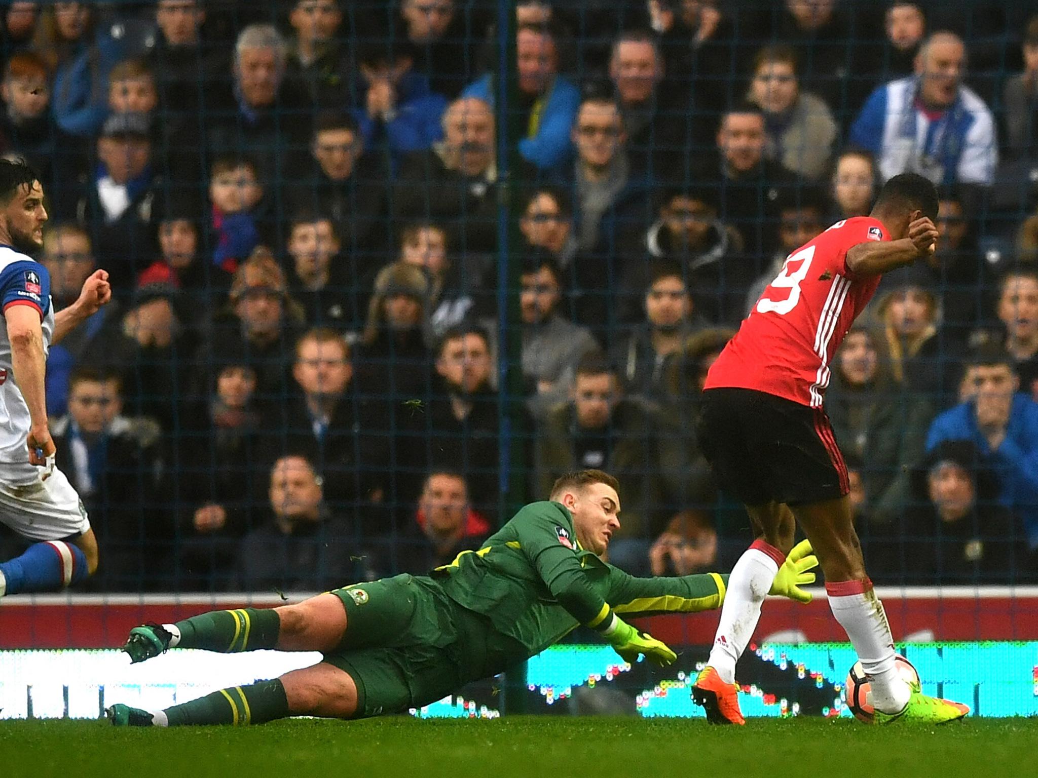 Made a handful of important saves throughout, but was beaten by Rashford and Ibrahimovic.