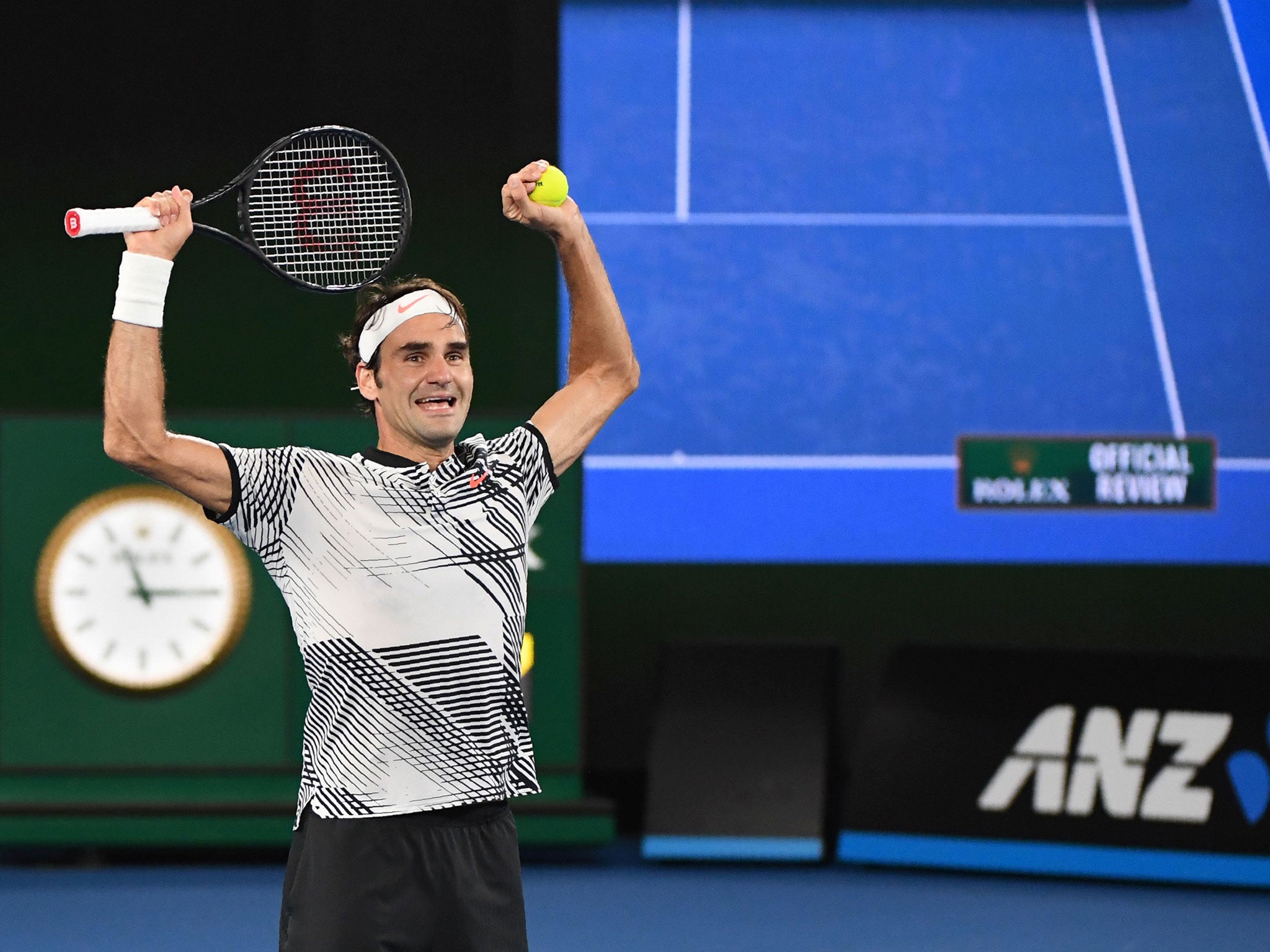 Federer celebrates after clinching his 18th Grand Slam title