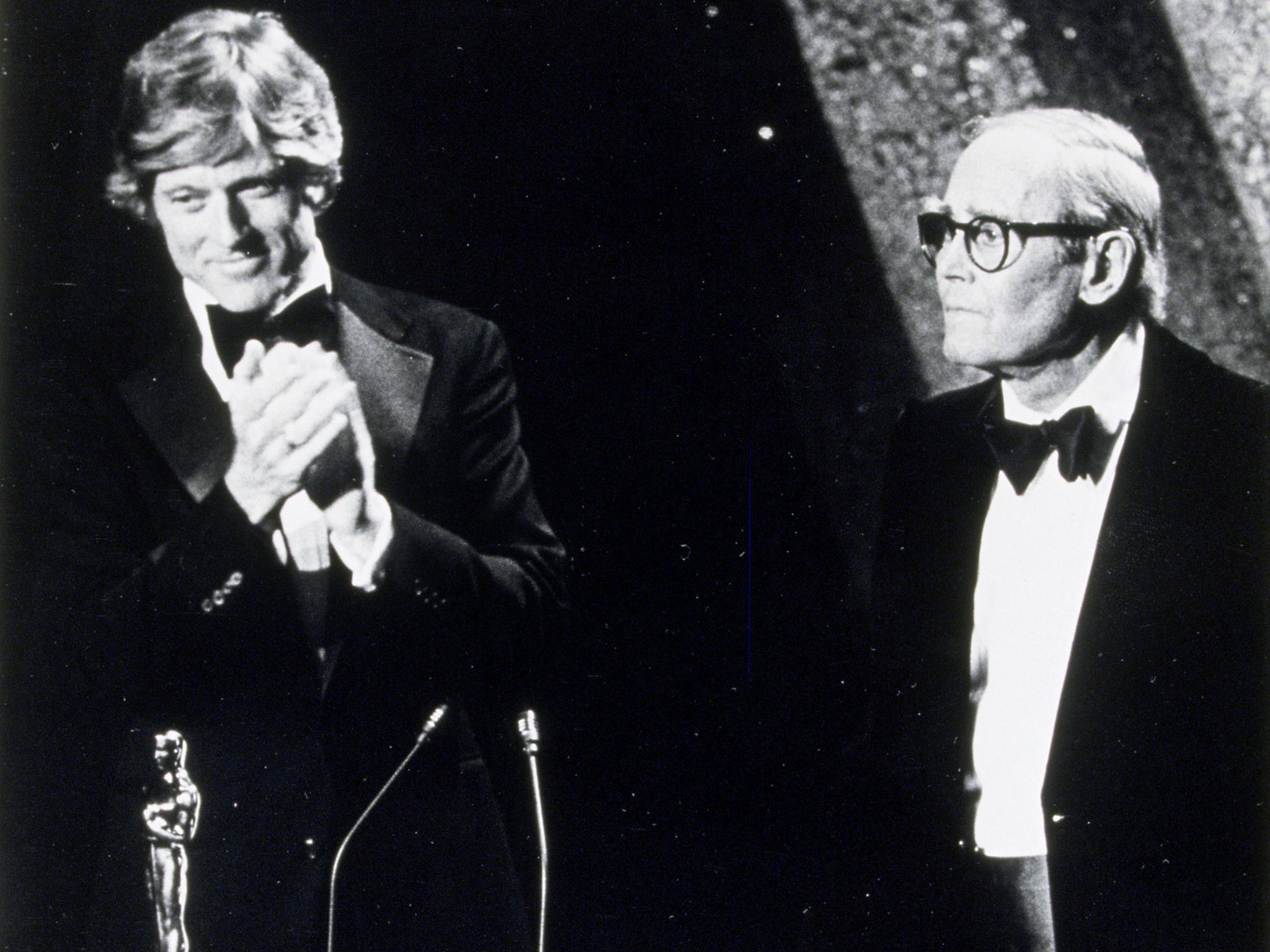 Henry Fonda receiving an Honorary Oscar in 1980 from Robert Redford