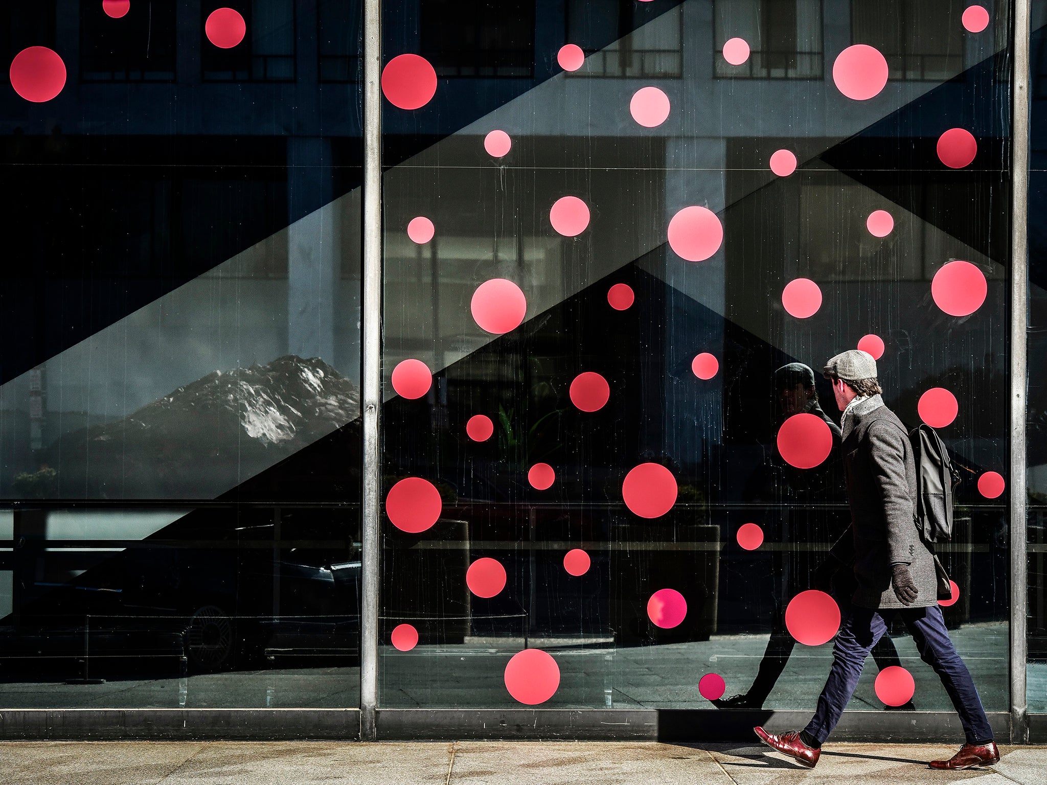 Polka dots adorn the windows as installation continues at the Hirshhorn Museum for the upcoming show Yayoi Kusama: Infinite Mirrors (Bill O’Leary/Washington Post)