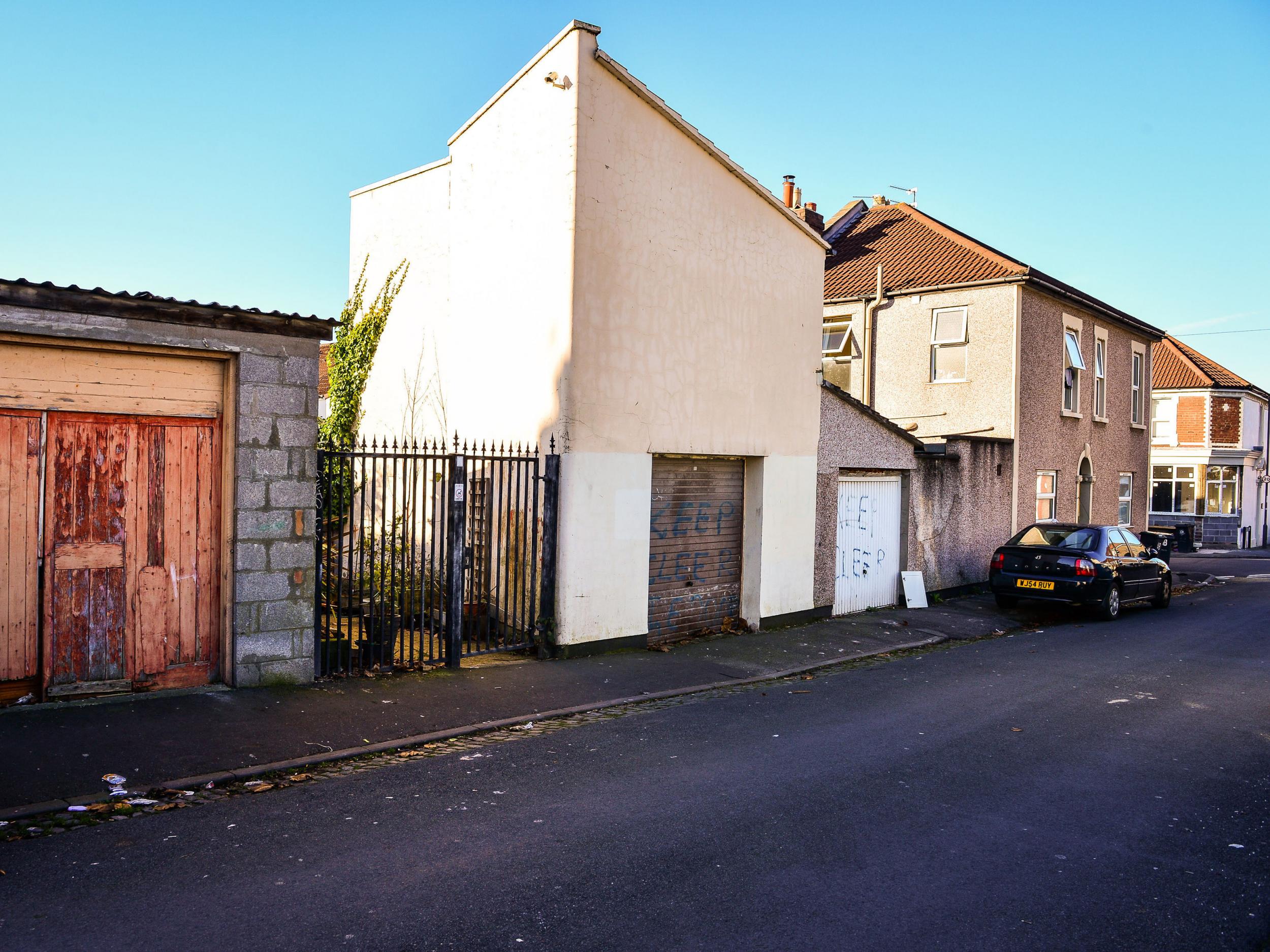 The gated entrance and garages on King Street, Easton, Bristol, where community race relations champion, Judah Adunbi was hit with a stun gun by police