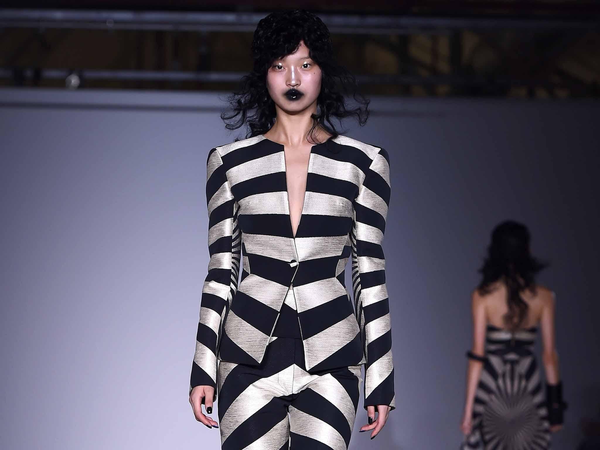 Gareth Pugh crafted a series of monochromatic sunburst-patterned looks for Spring 2017