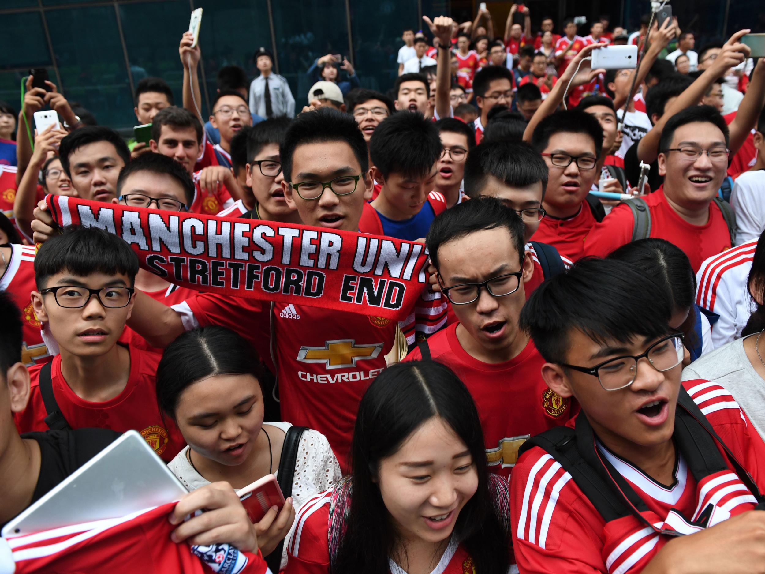 Manchester United fans in China wait for their heroes