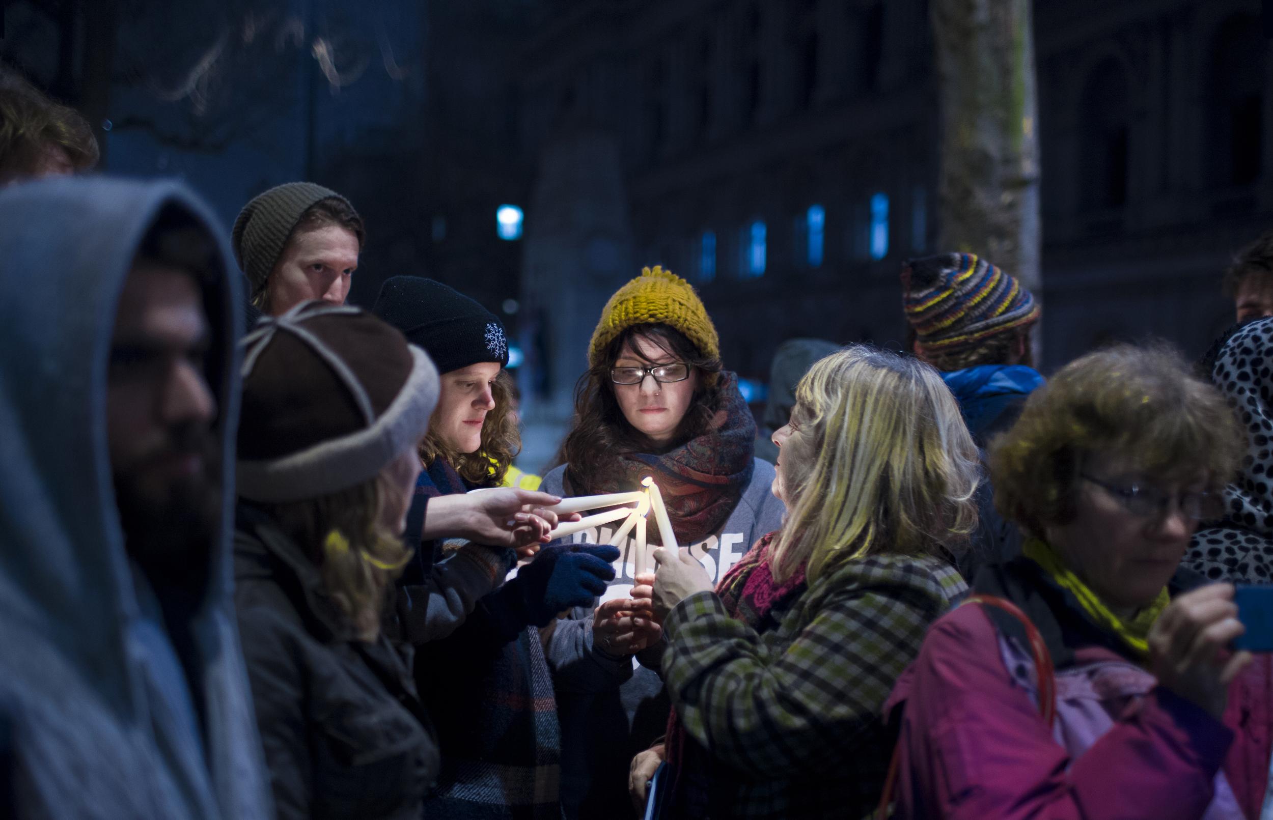 Dozens of people attended the 'solidarity sleep-out' outside Downing Street on Wednesday night to speak out for homeless child refugees in France