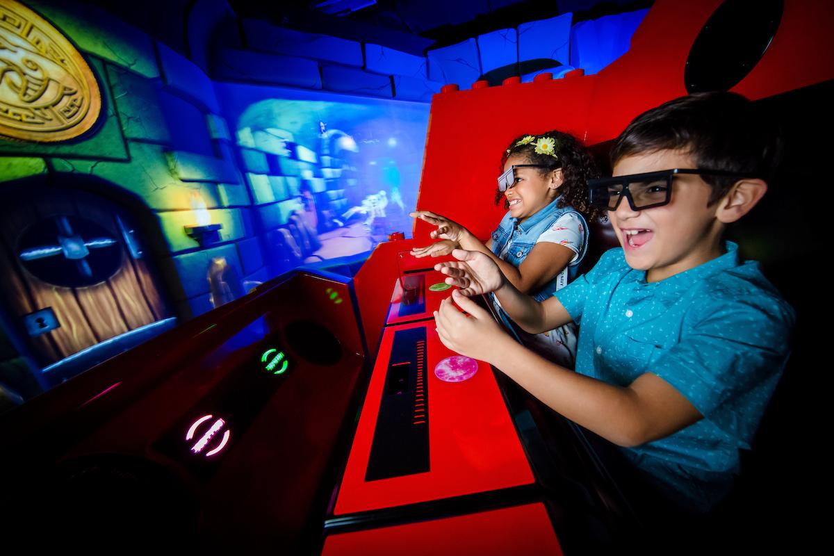 Ninjago the Ride involves throwing virtual reality orbs at enemies