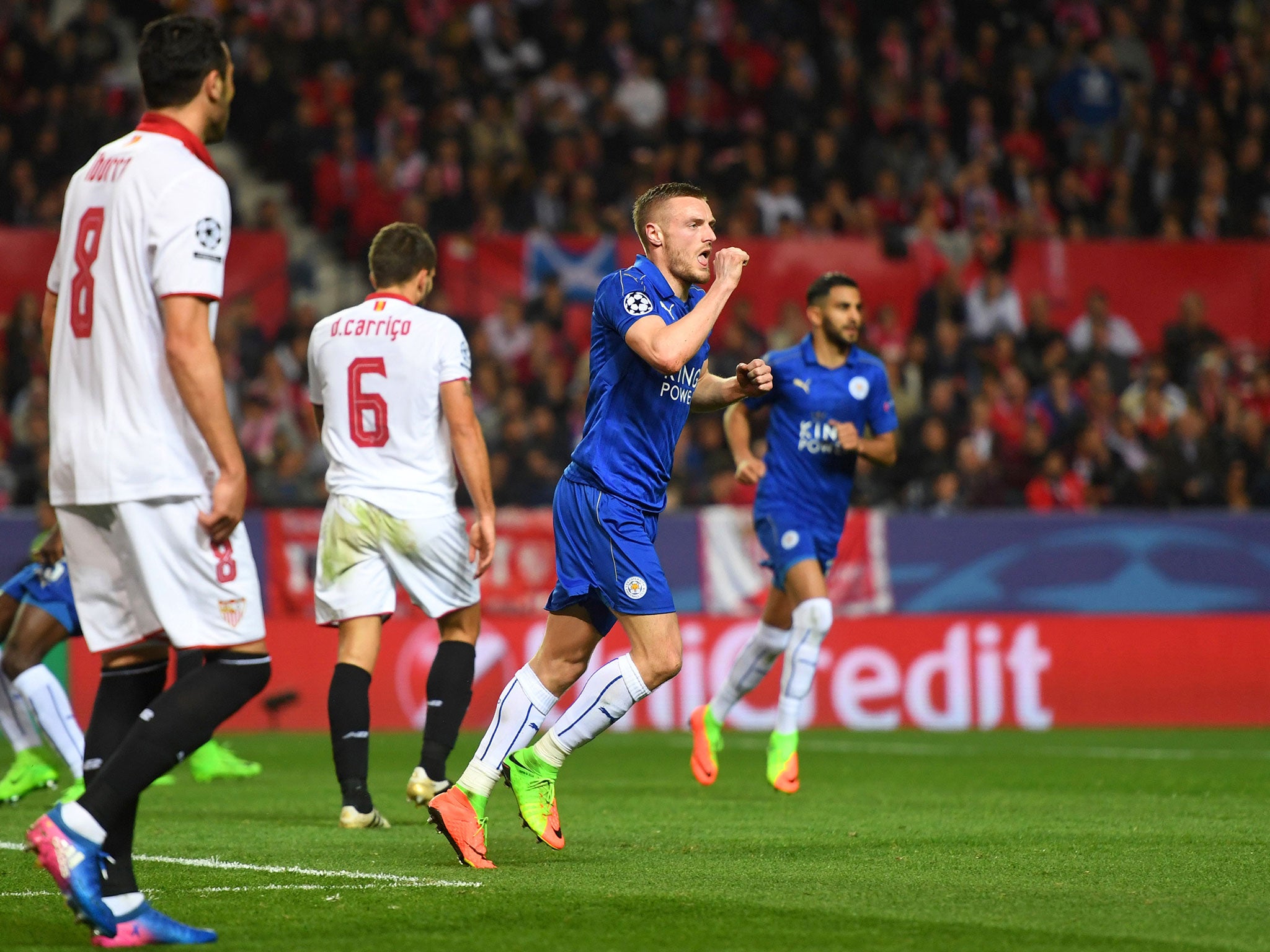 Jamie Vardy celebrates after scoring Leicester's vital away goal