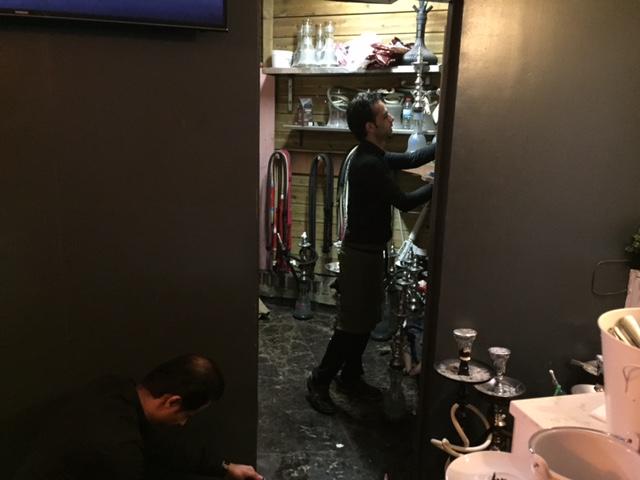 A waiter in the hookah store room at popular Beit el Zaytoun on the canal side