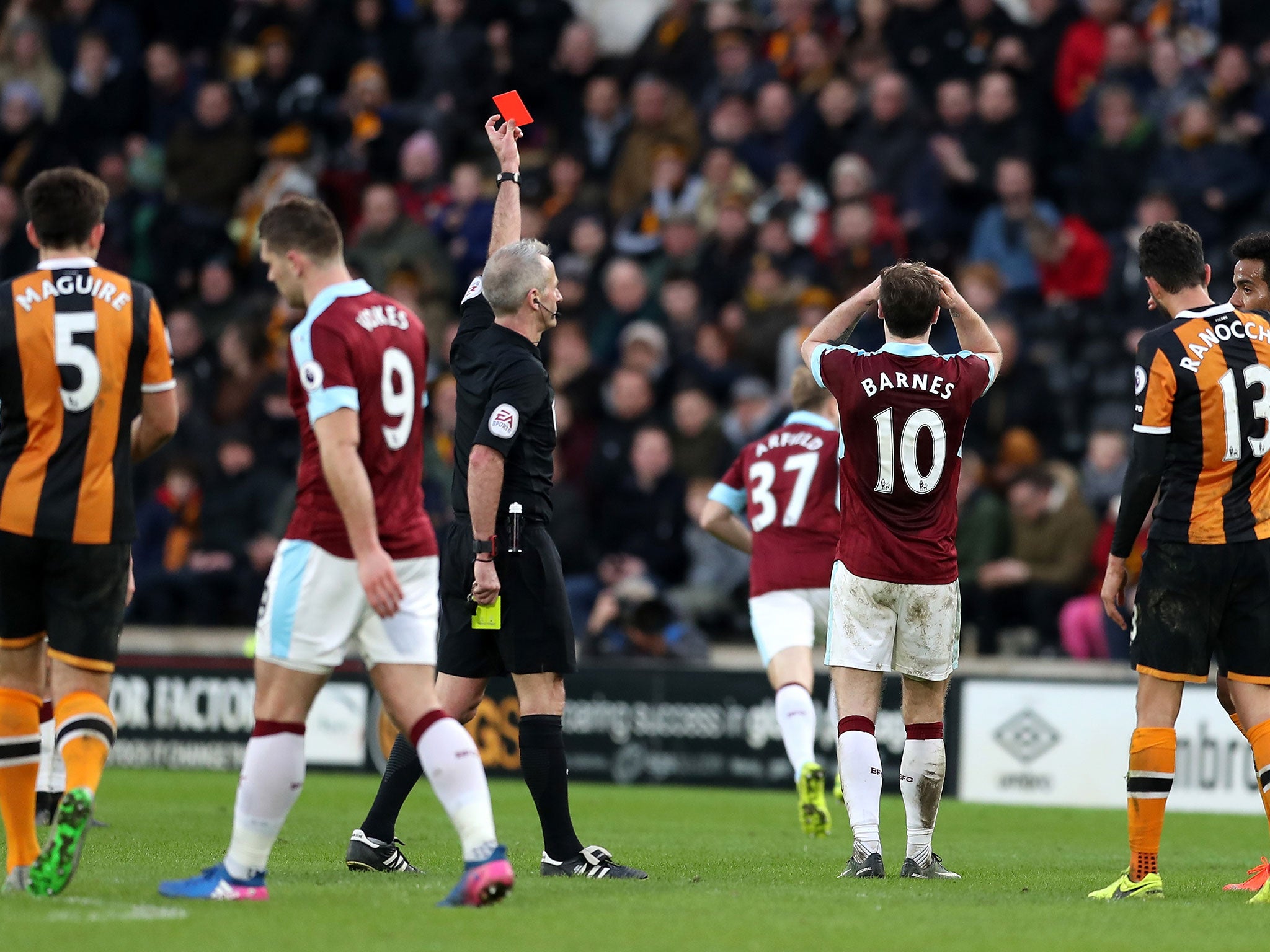 Ashley Barnes is shown red