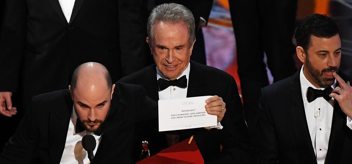 Warren Beatty holding up Moonlight's winning card