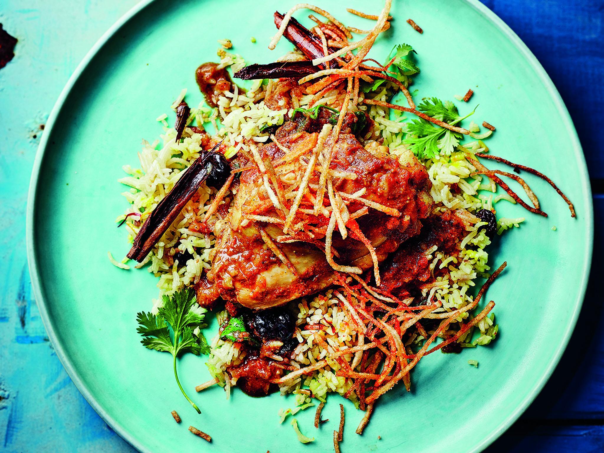 Crispy fried potato straws make a perfect topping for Parsi salli chicken