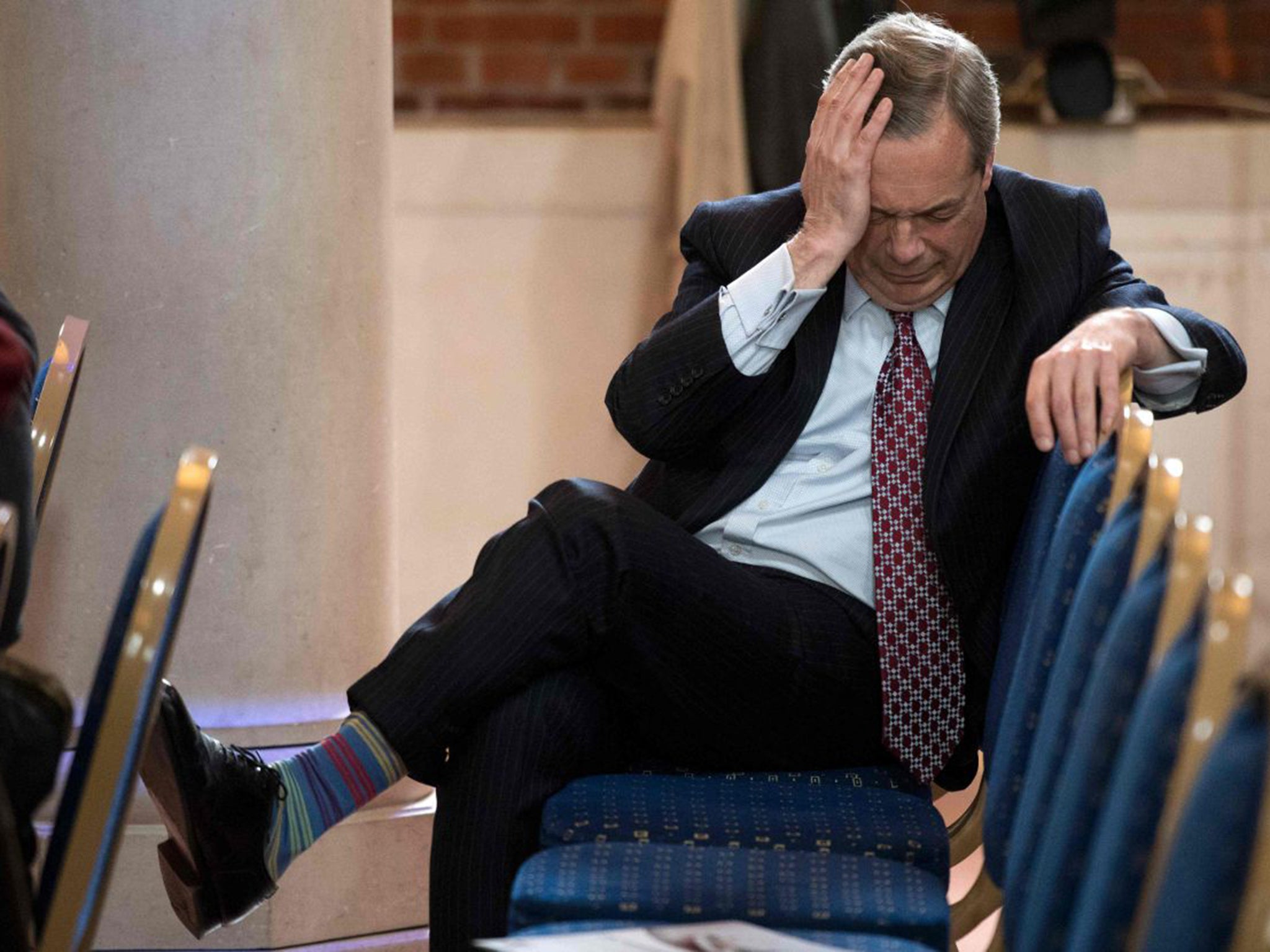 Nigel Farage sits in the audience during a press conference in London in February 2017