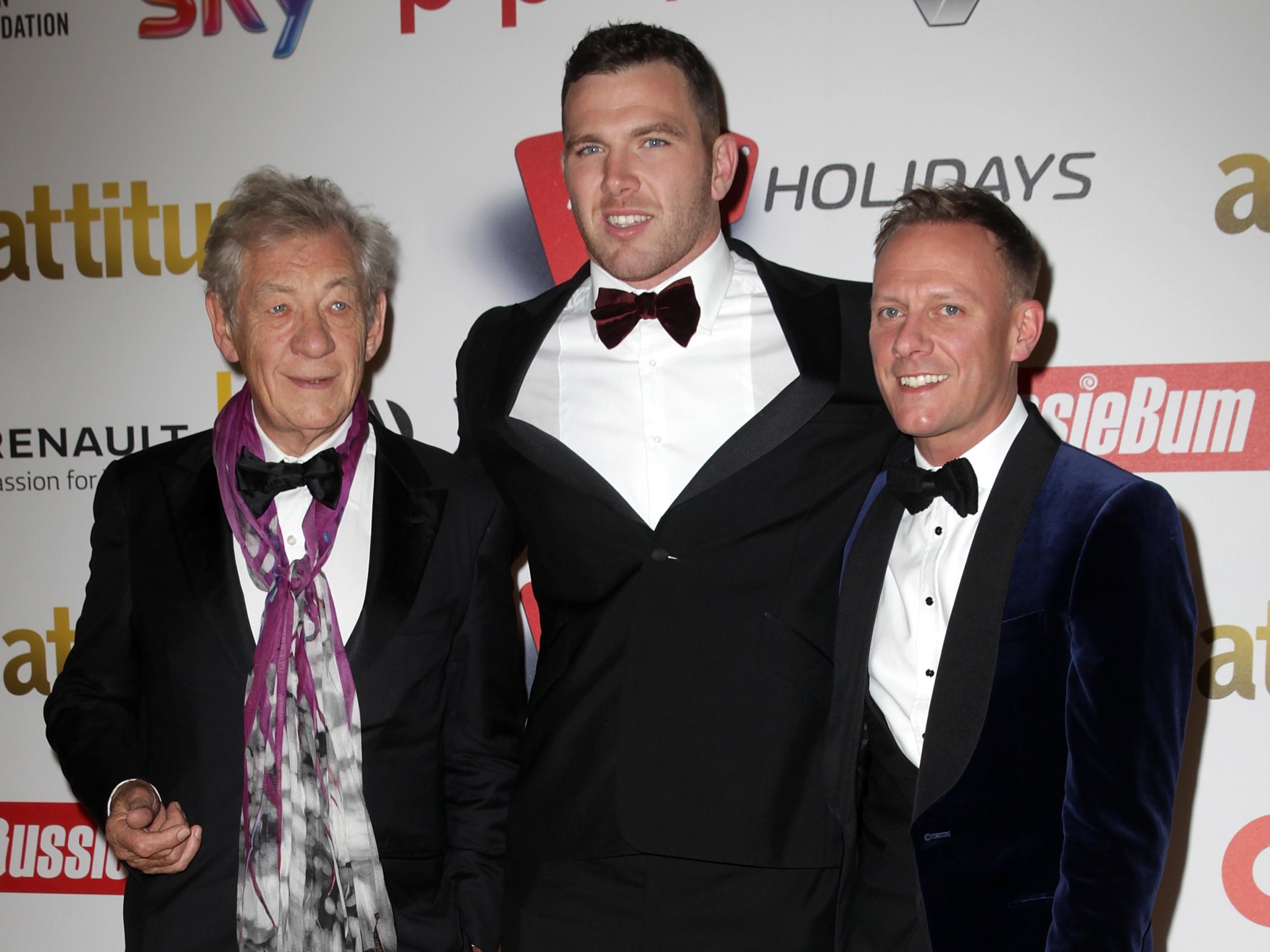 Hirst with Sir Ian McKellen and Antony Cotton at the Attitude Magazine Awards