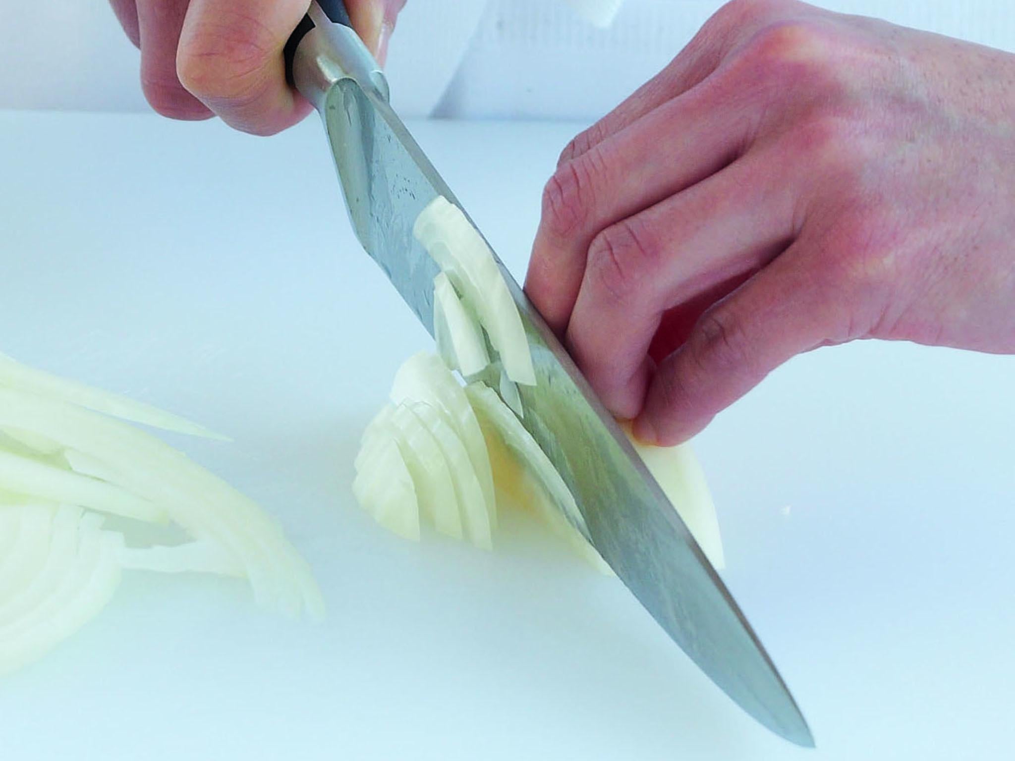 3. As you reach the root end of the onion, turn the onion on to the largest flat side and slice again, ensuring no onion is wasted.