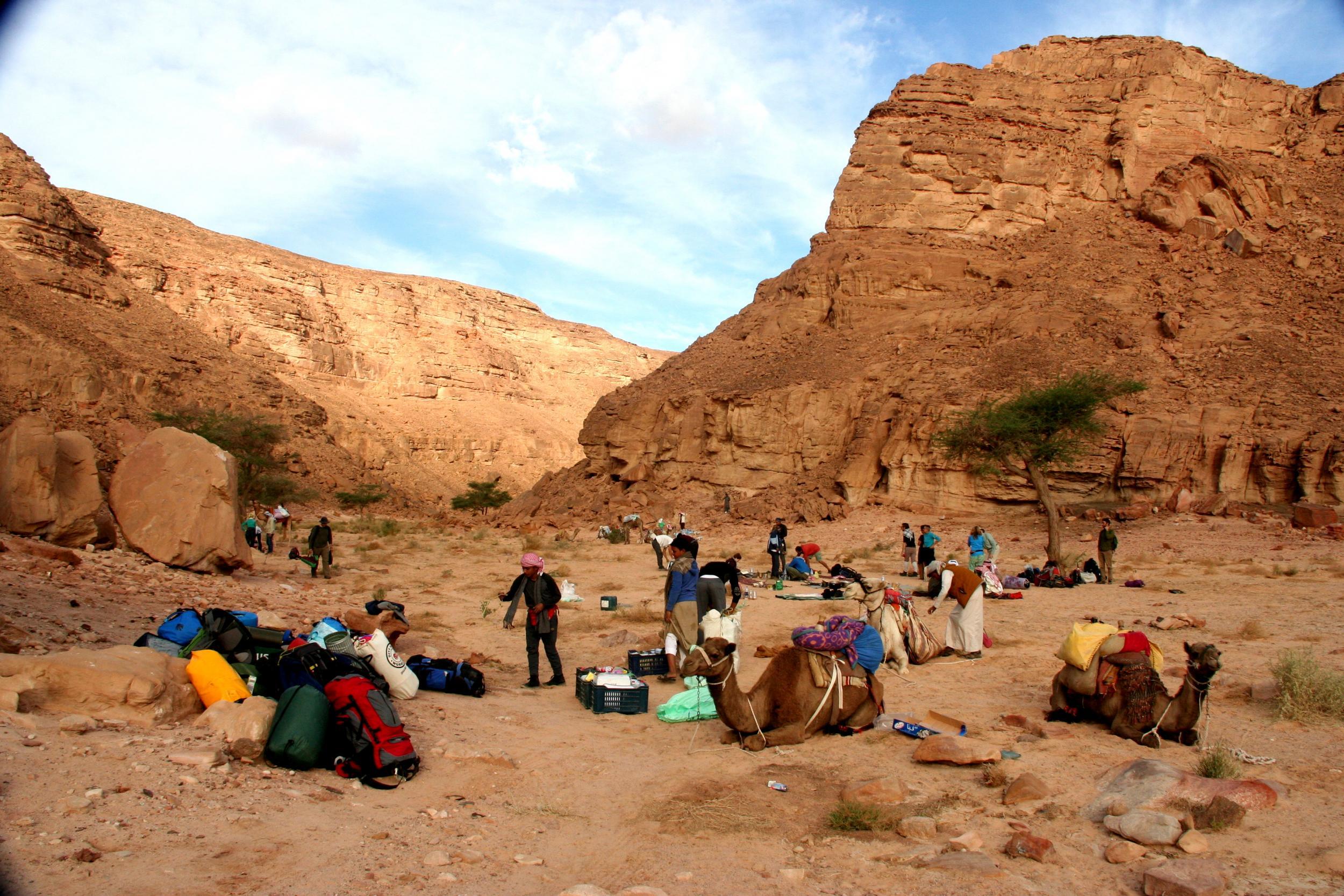 Breaking camp along the trail