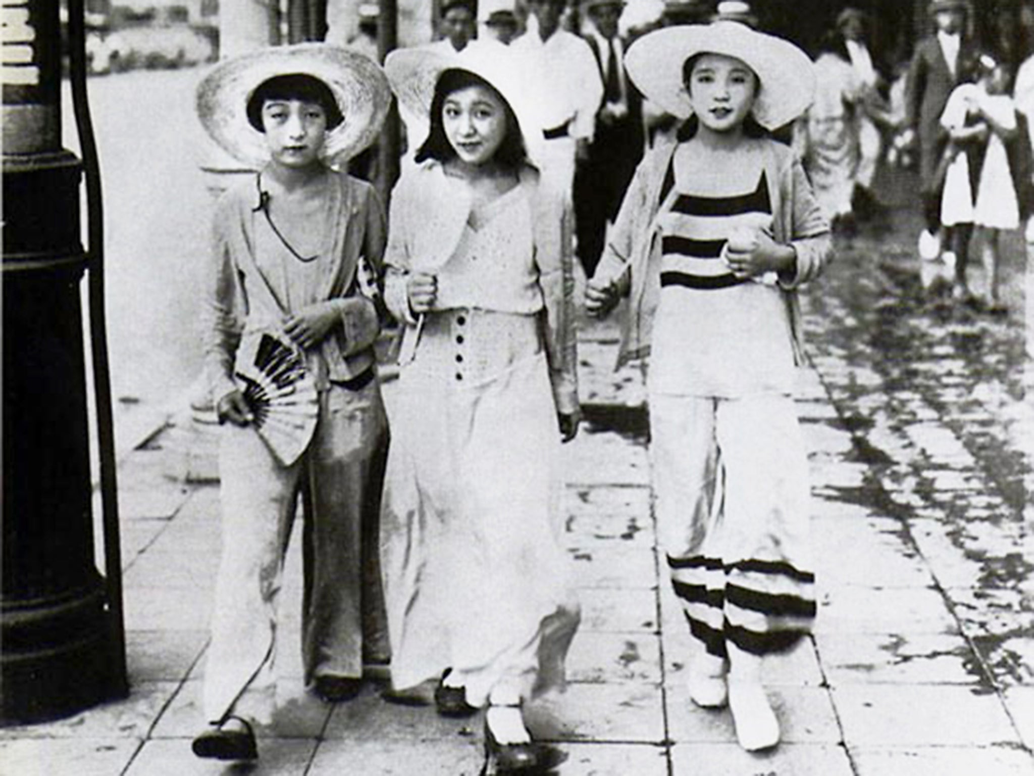 Young moga (modern girls) walk down a Ginza street in 1928 dressed in 'Beach Pyjama Style'