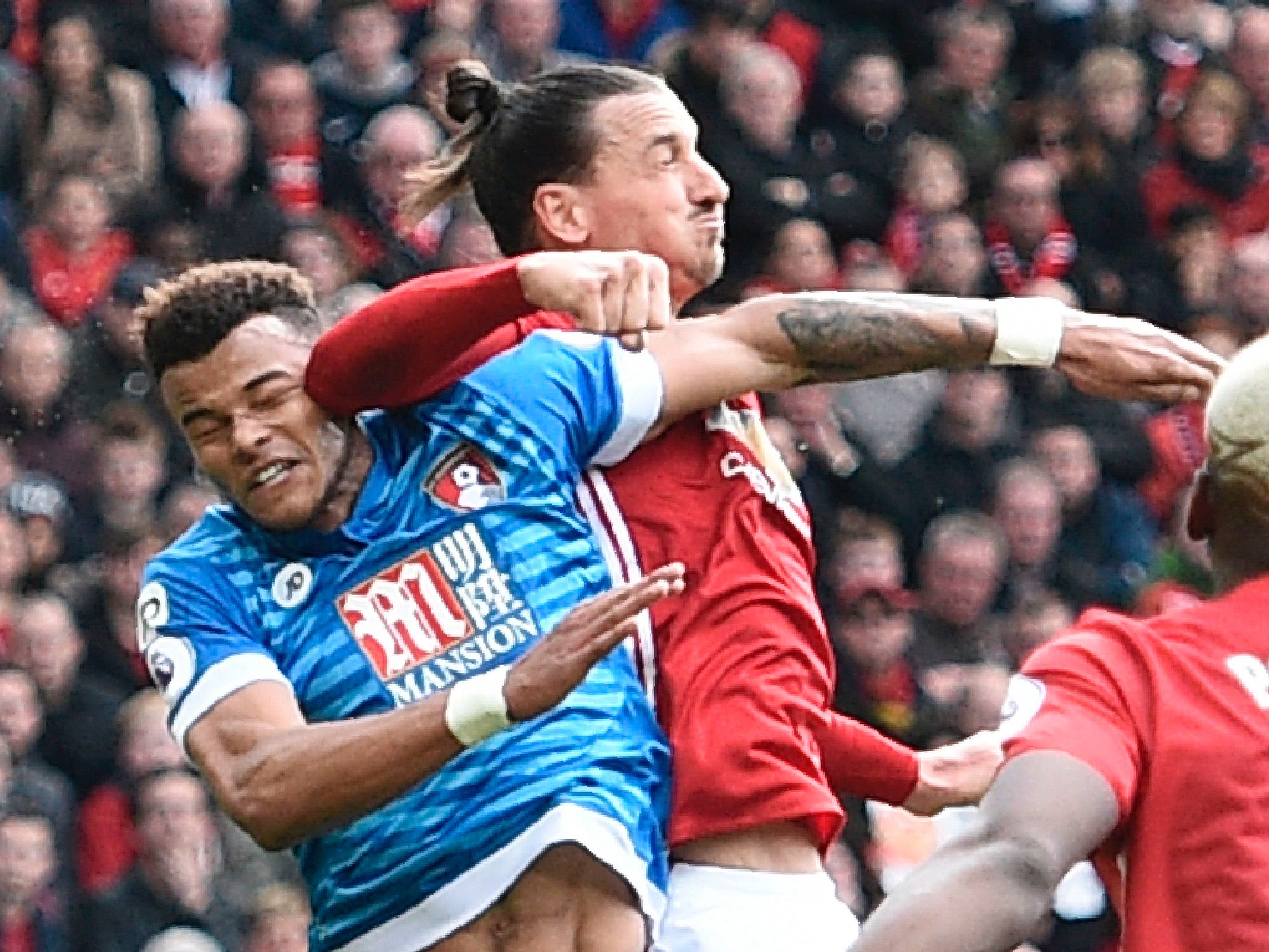 Zlatan Ibrahimovic appeared to elbow Tyrone Mings after the Bournemouth defender had stamped on his head