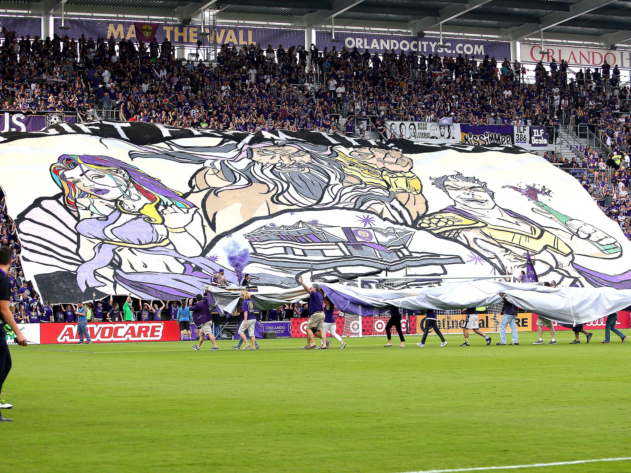 Orlando supporters unveil their banner, featuring a subtle tribute to the Pulse nightclub shooting victims