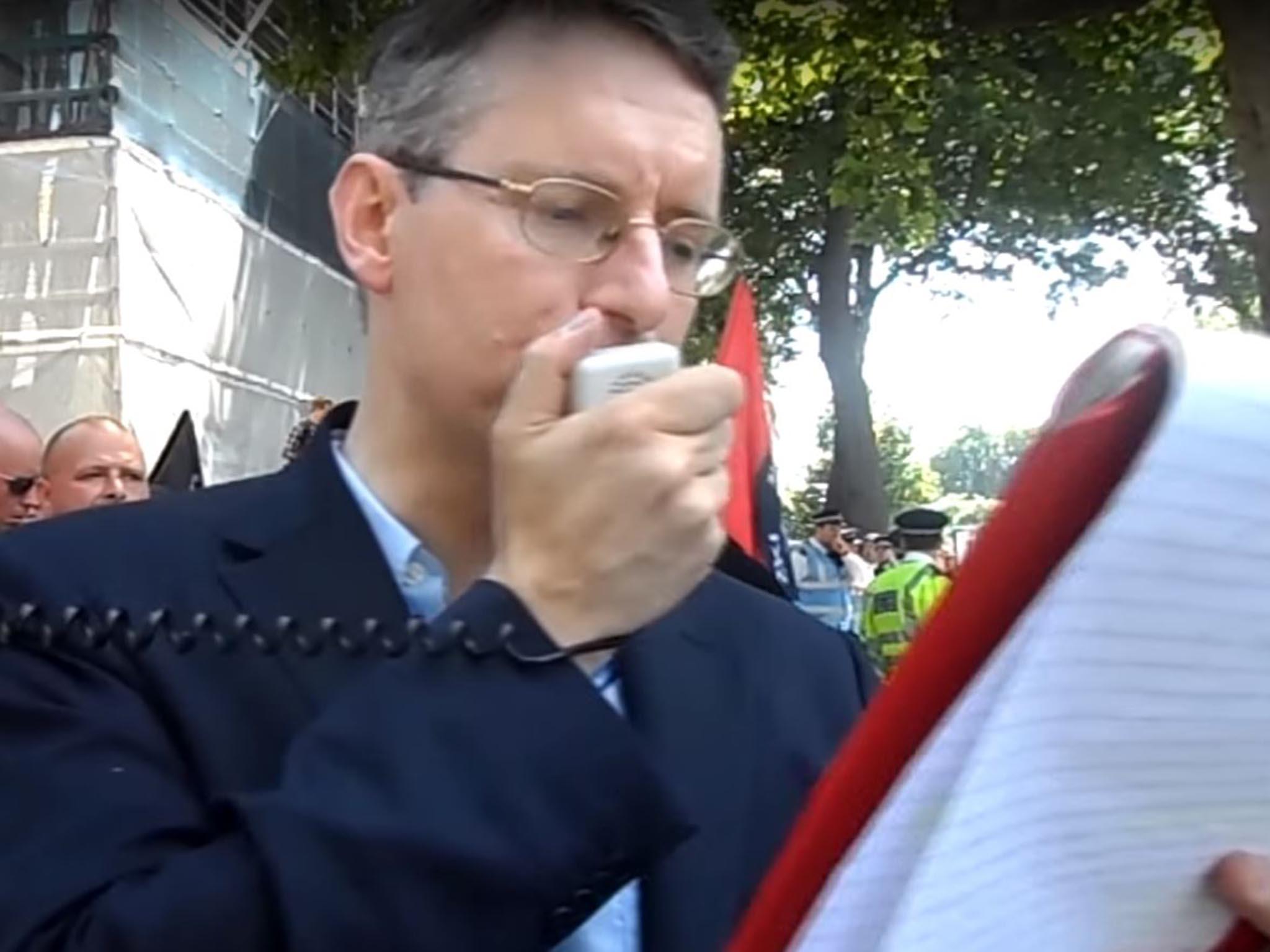 Jeremy Bedford Turner addresses the small protest outside Whitehall in July 2015