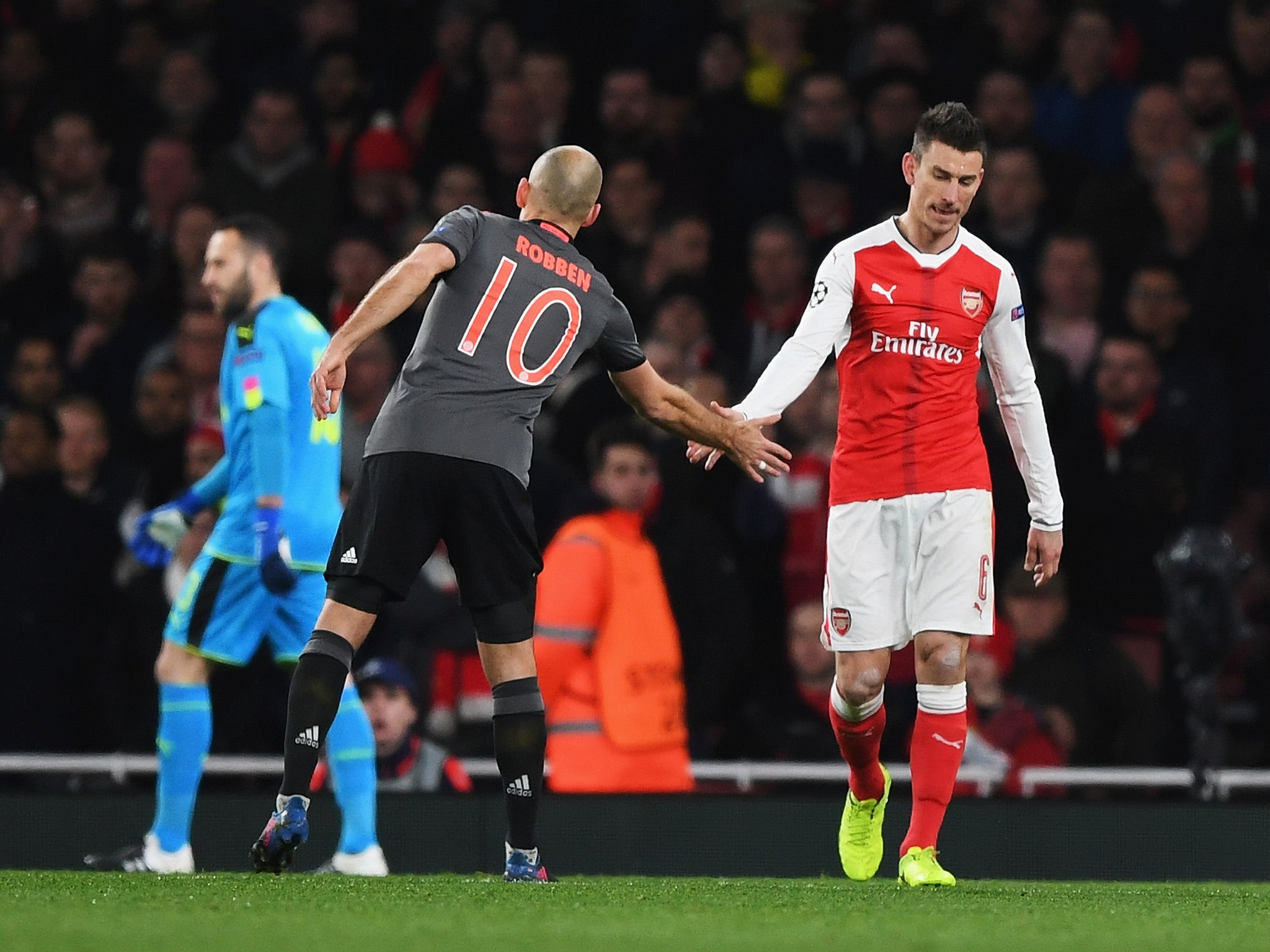 Laurent Koscielny conceded a spot-kick and was shown red after a challenge on Robert Lewandowski