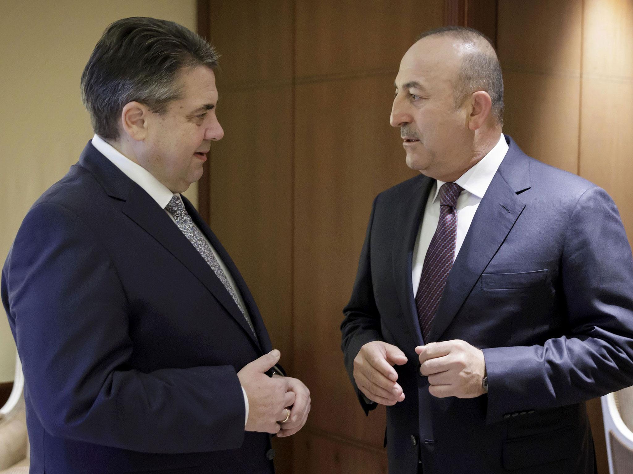 German foreign minister Sigmar Gabriel meets his Turkish counterpart Mevlut Cavusoglu at the Adlon hotel in Berlin, Germany