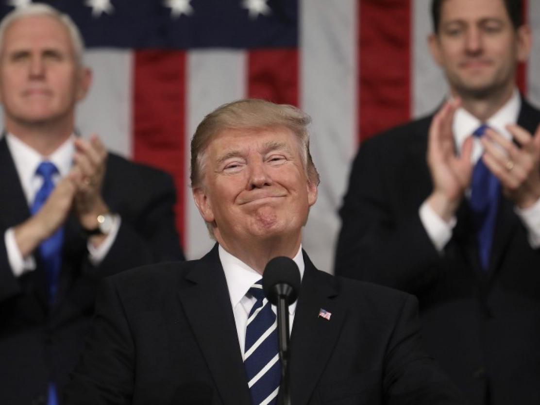 Vice President Pence and Speaker of the House Paul D. Ryan applaud as President Trump delivers his address to a joint session of Congress on February 28