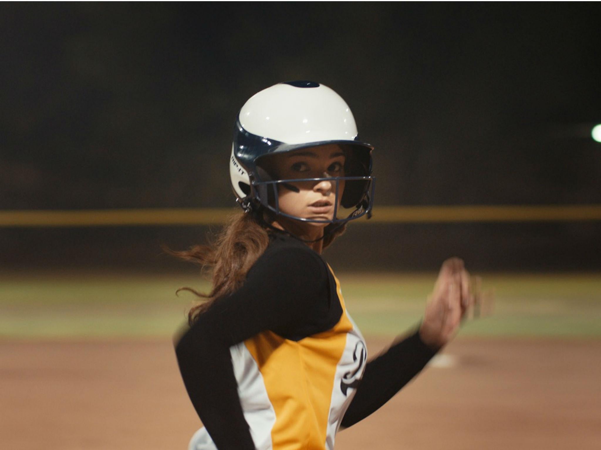 Hildebrand plays Sasha, the star player in the high school softball team who begins a relationship with Anne (Gelula), editor of the school yearbook in 'First Girl I Loved'