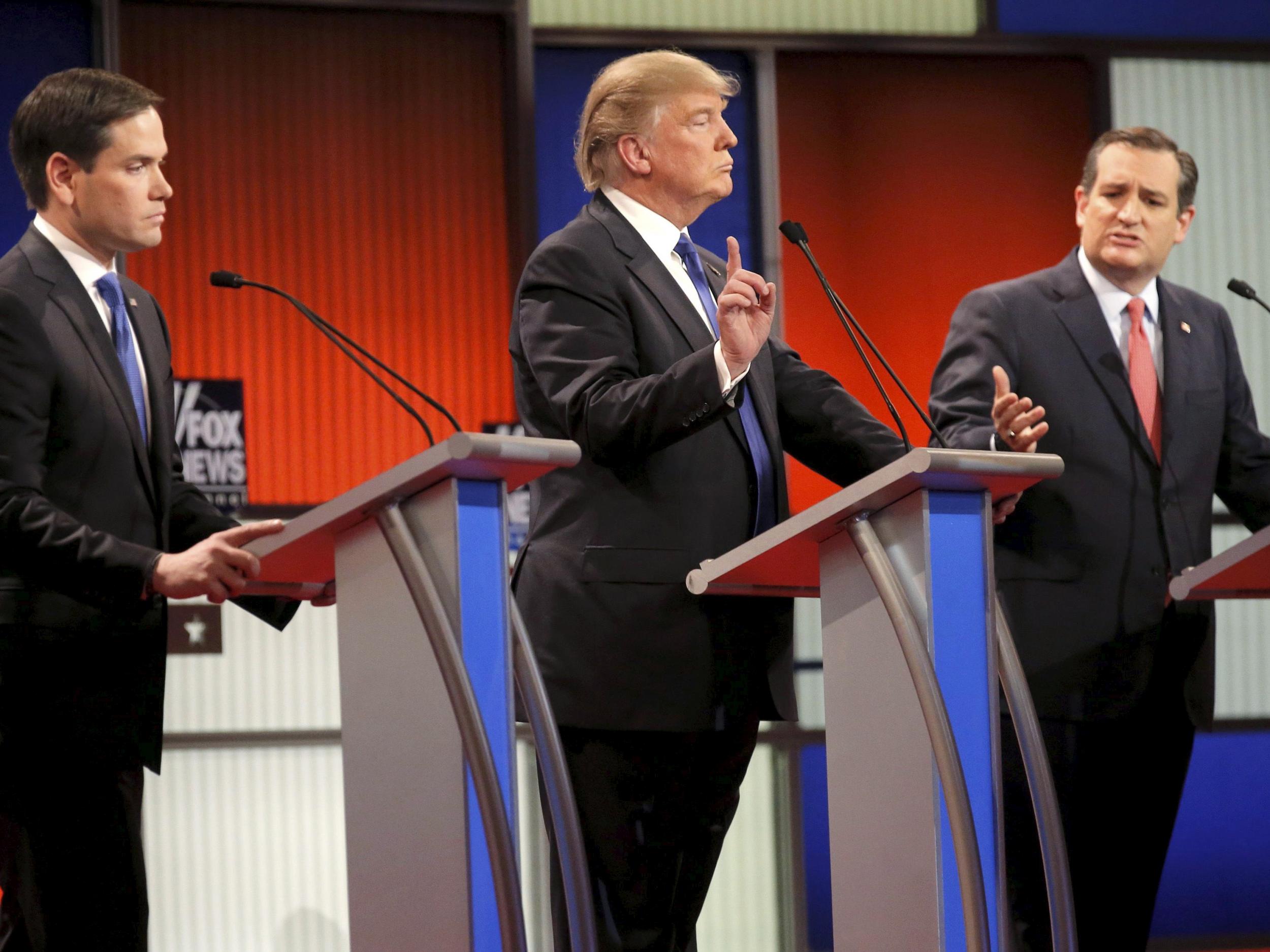 Donald Trump during a heated debate with fellow Republican presidential candidates Marco Rubio (left) and Ted Cruz (right) during last year's campaign