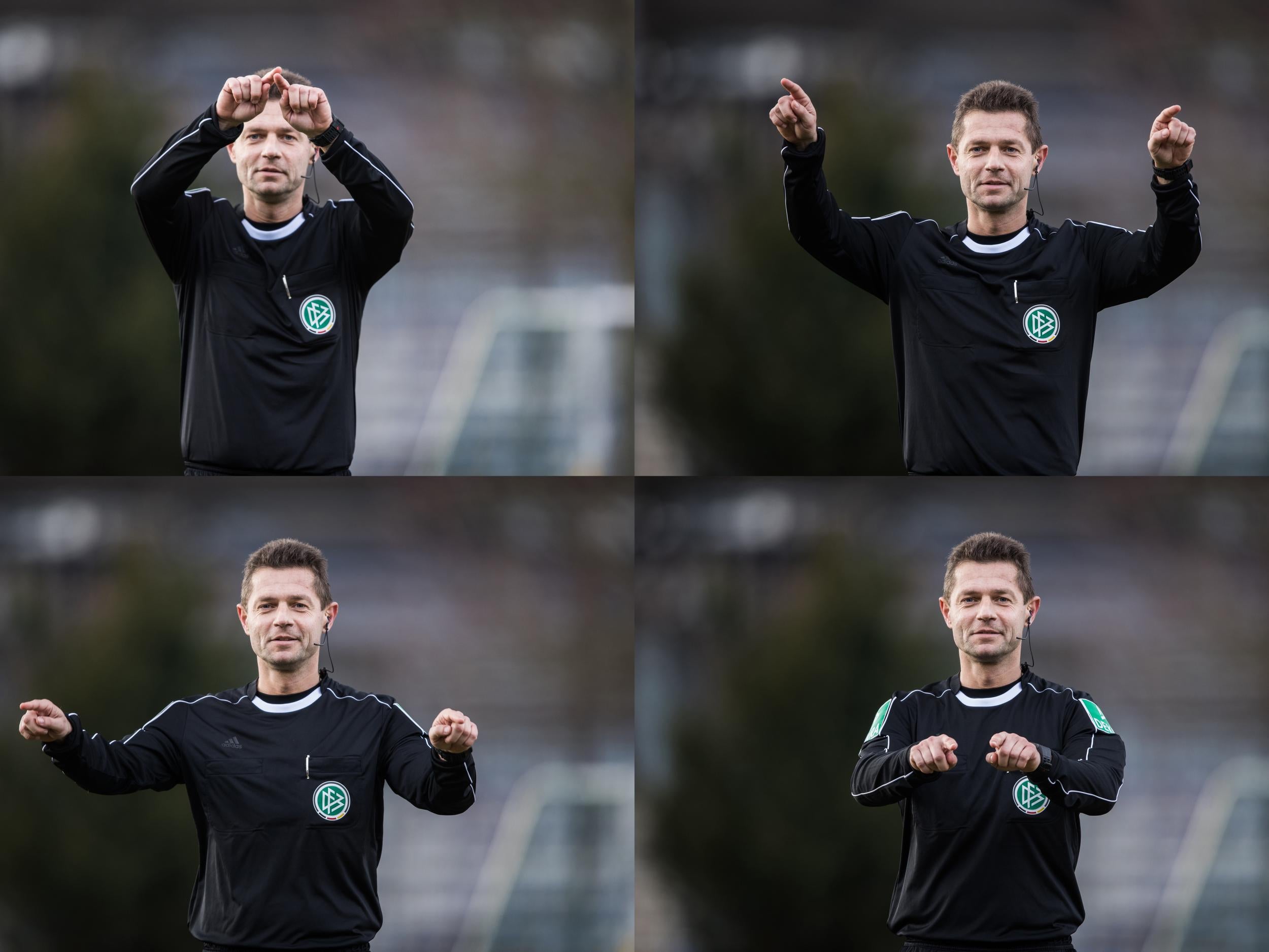 A referee gesturing for video assistant support in a German trial match