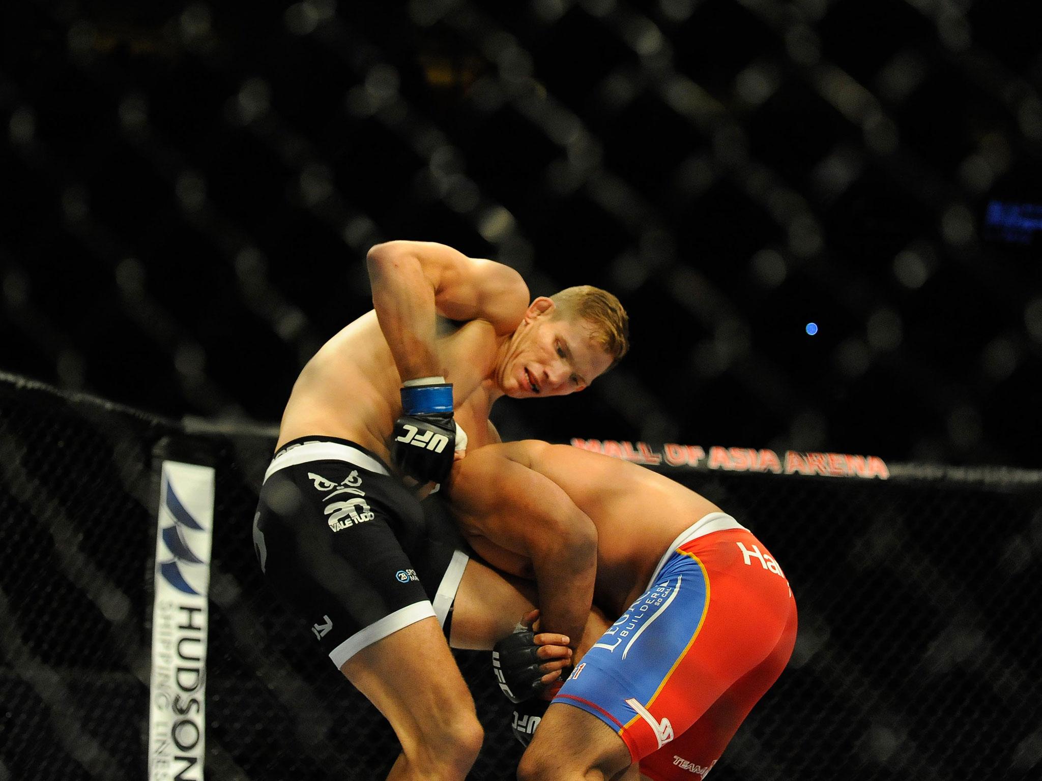 Luke Barnatt grapples with Mark Munoz during their bout at the UFC Fight Night in May 2015