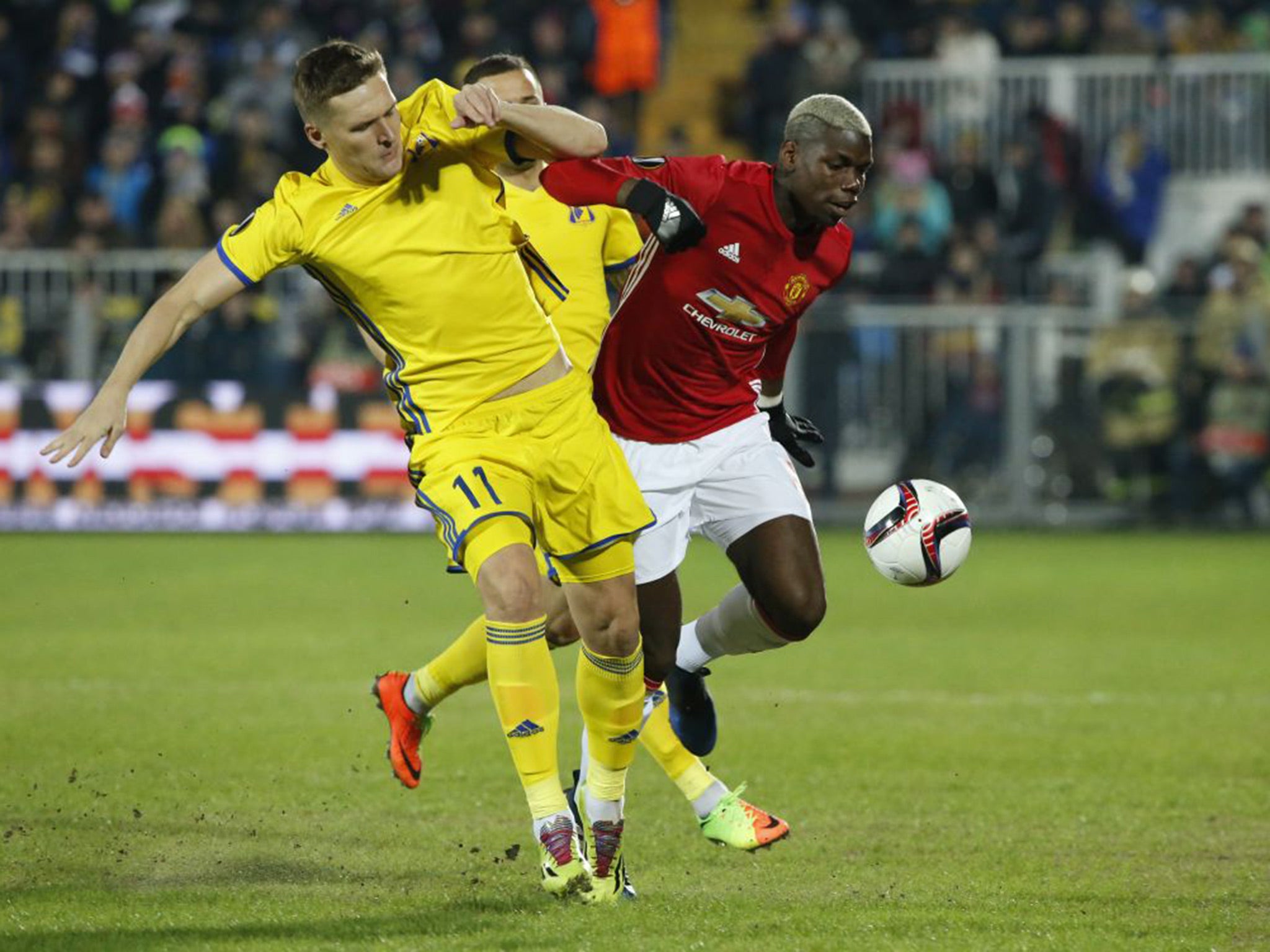 Manchester United's Paul Pogba battles for the ball in the opening stages