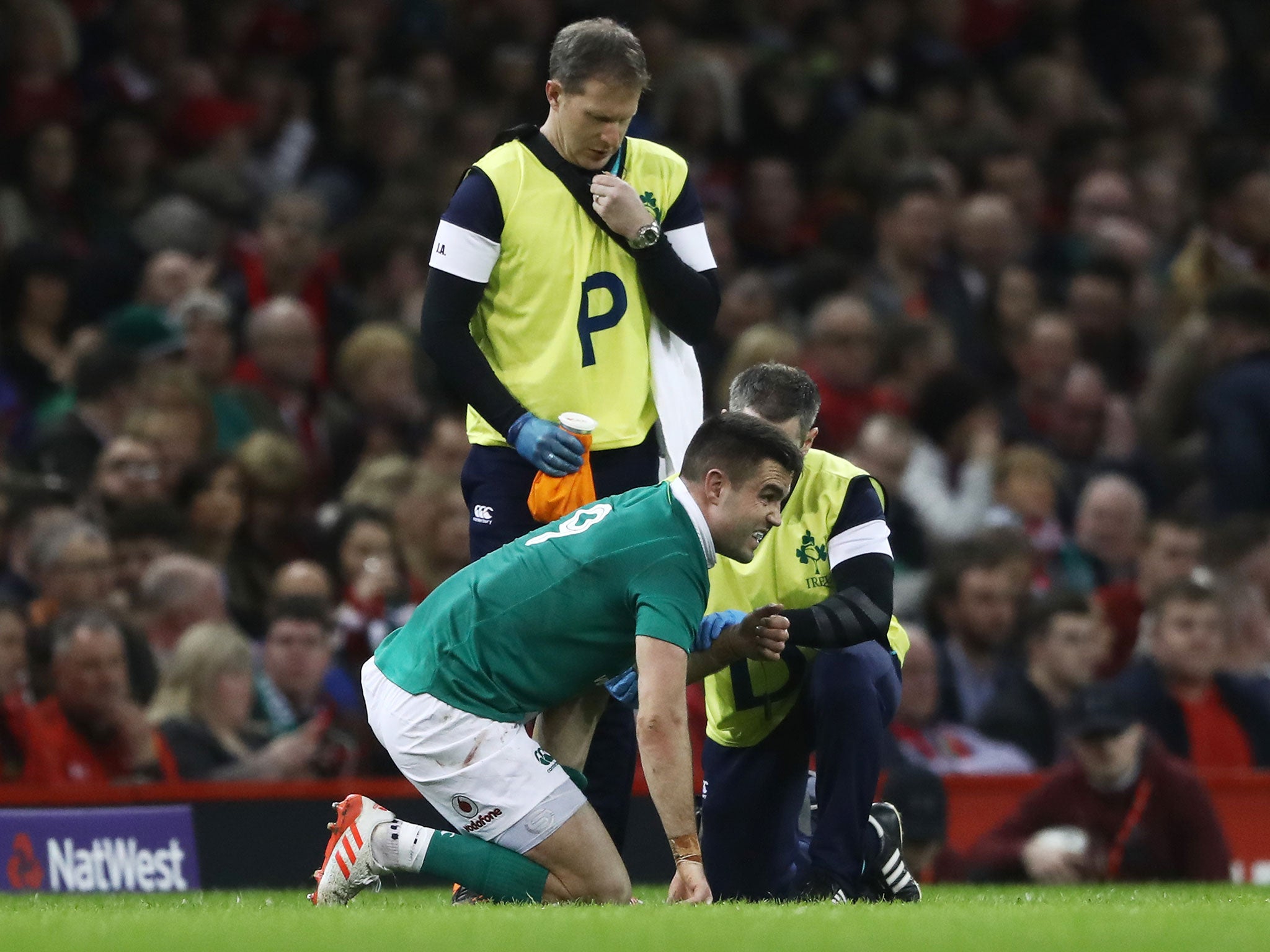 Conor Murray receives treatment after taking a knock