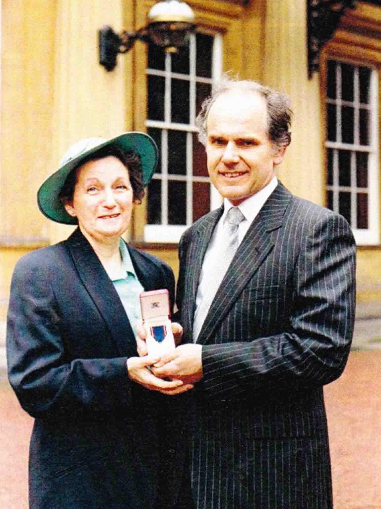 Mr Skerritt at Buckingham Palace with wife, Patricia, after receiving his Royal Victorian Medal in 1991